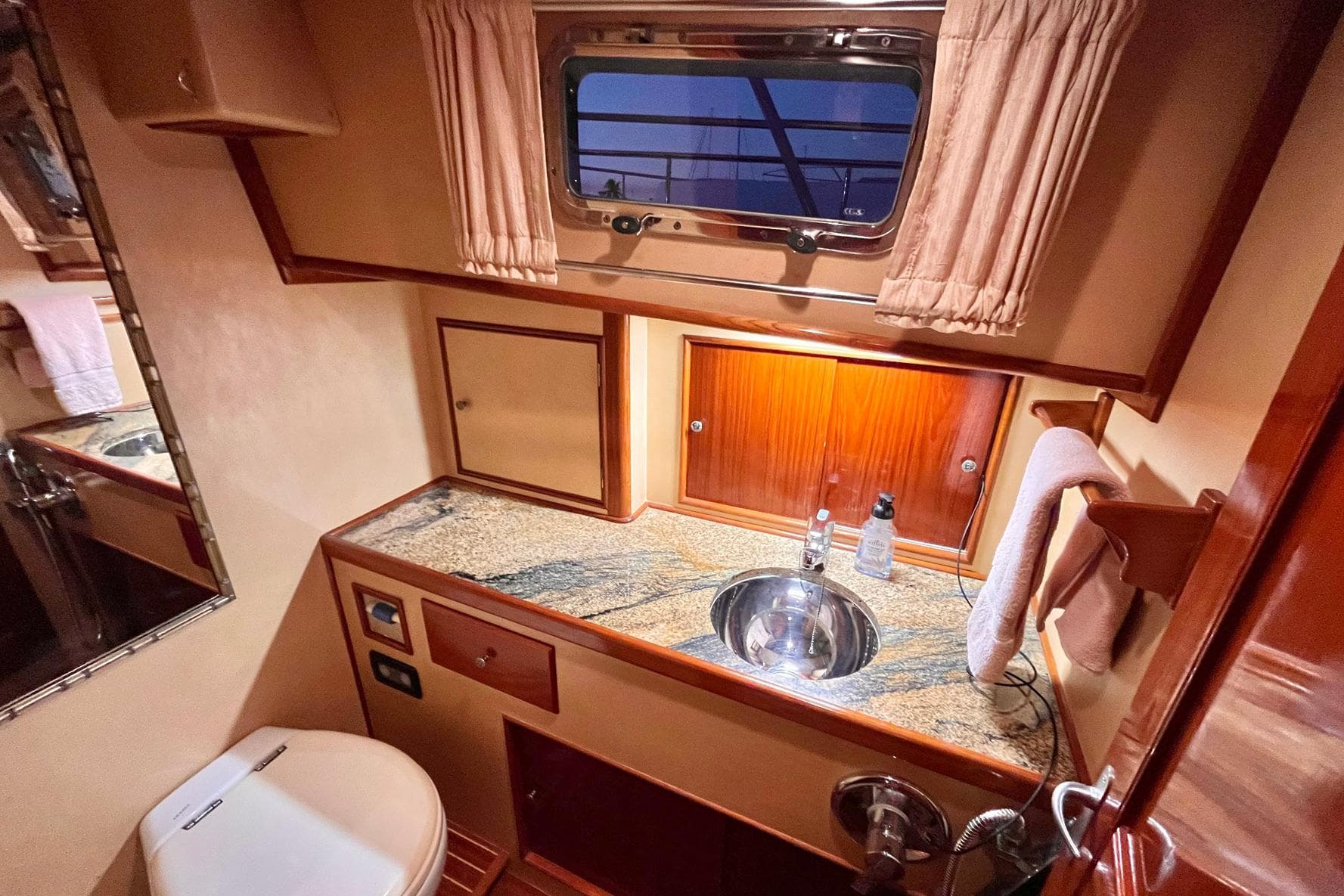 Luxurious bathroom interior of 2001 Grand Banks 49 Eastbay HX yacht.