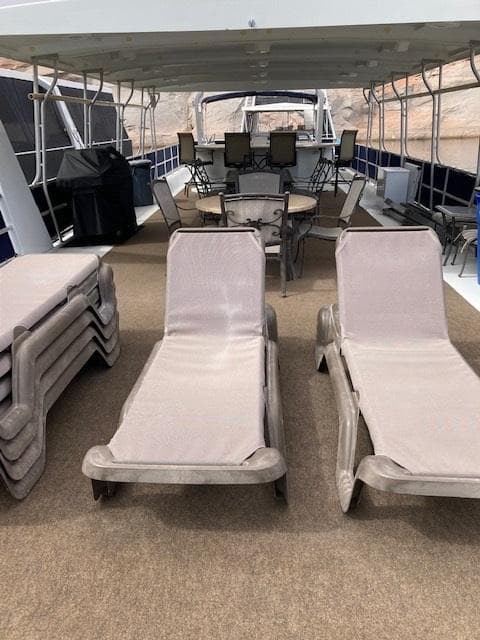Deck of a Sharpe Kohala Sun Trip boat with loungers, 2008.