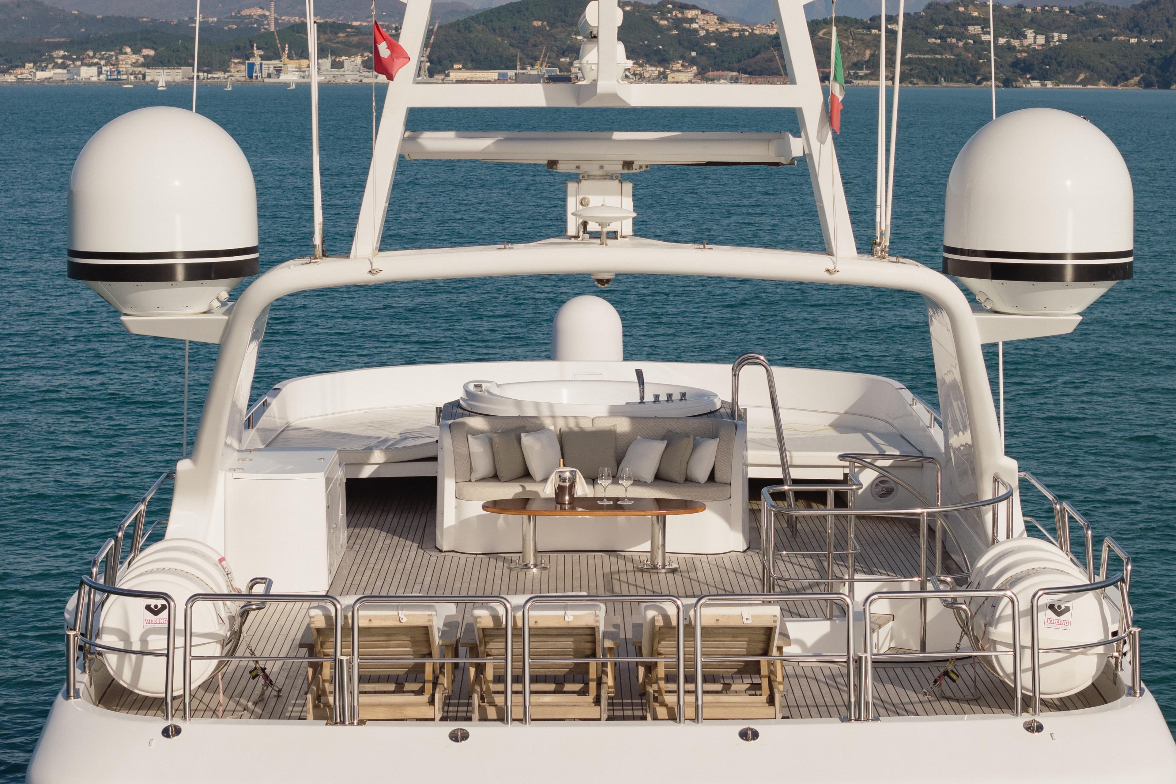 Luxurious Benetti Classic 115 yacht deck with seating, ocean view, 2000 model.