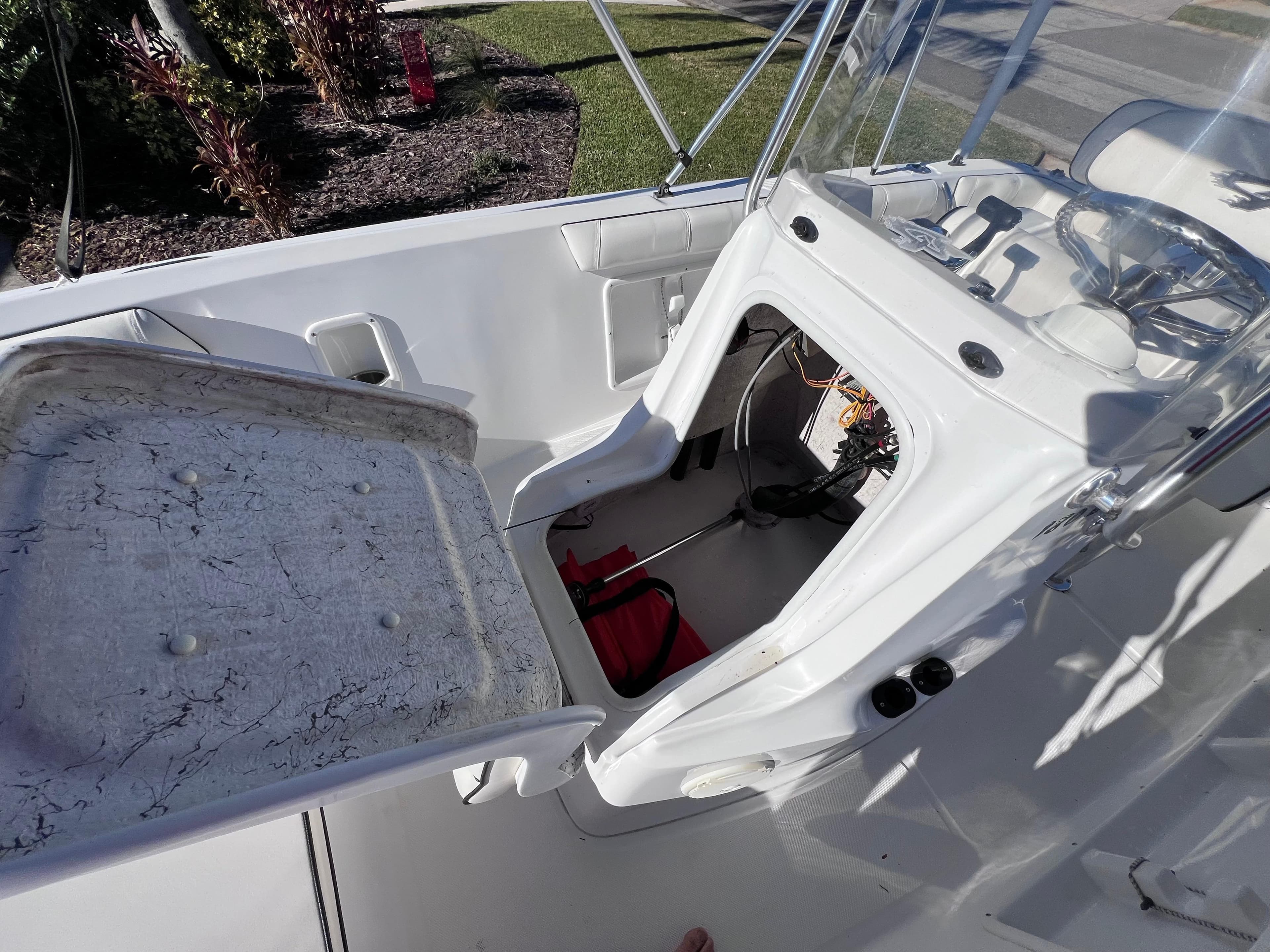 2021 Glasstream 180 CC boat interior with console and storage area.