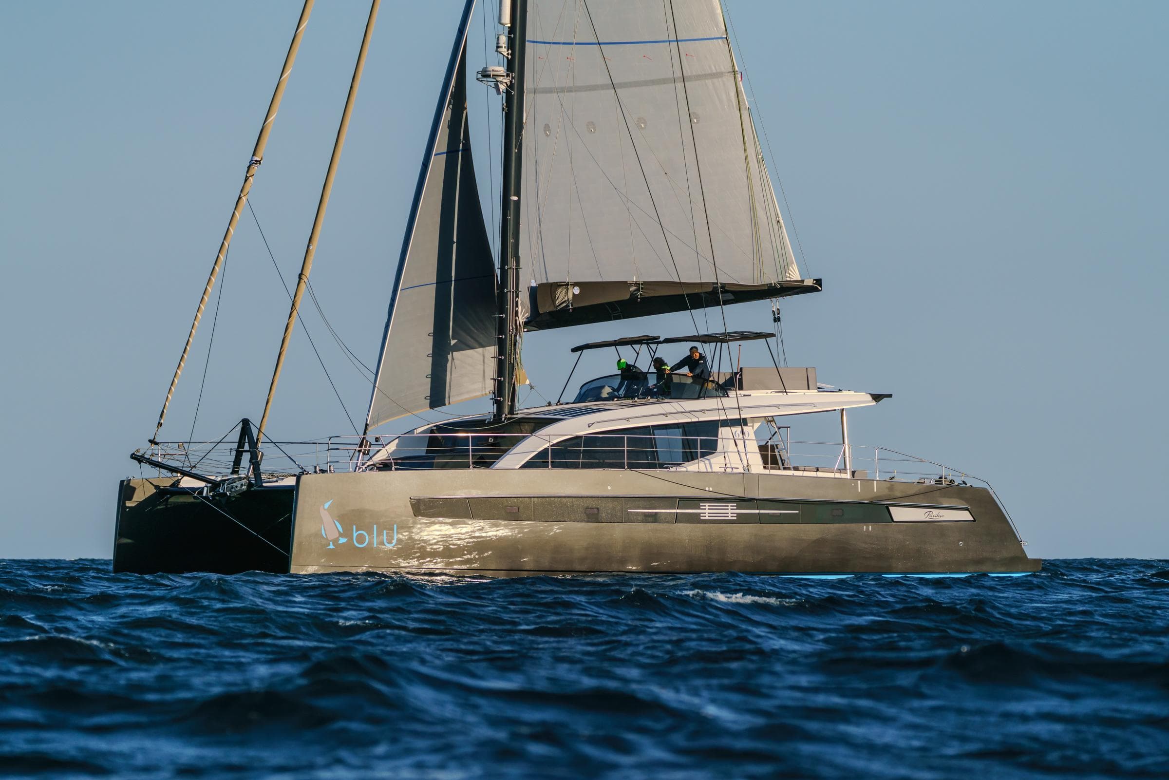 Luxury Privilege Signature 650 catamaran sailing on open sea, 2025 model.