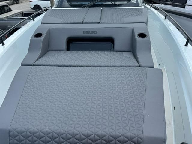 2024 BRABUS Shadow 1000 ST boat with luxurious gray seating and sleek design.