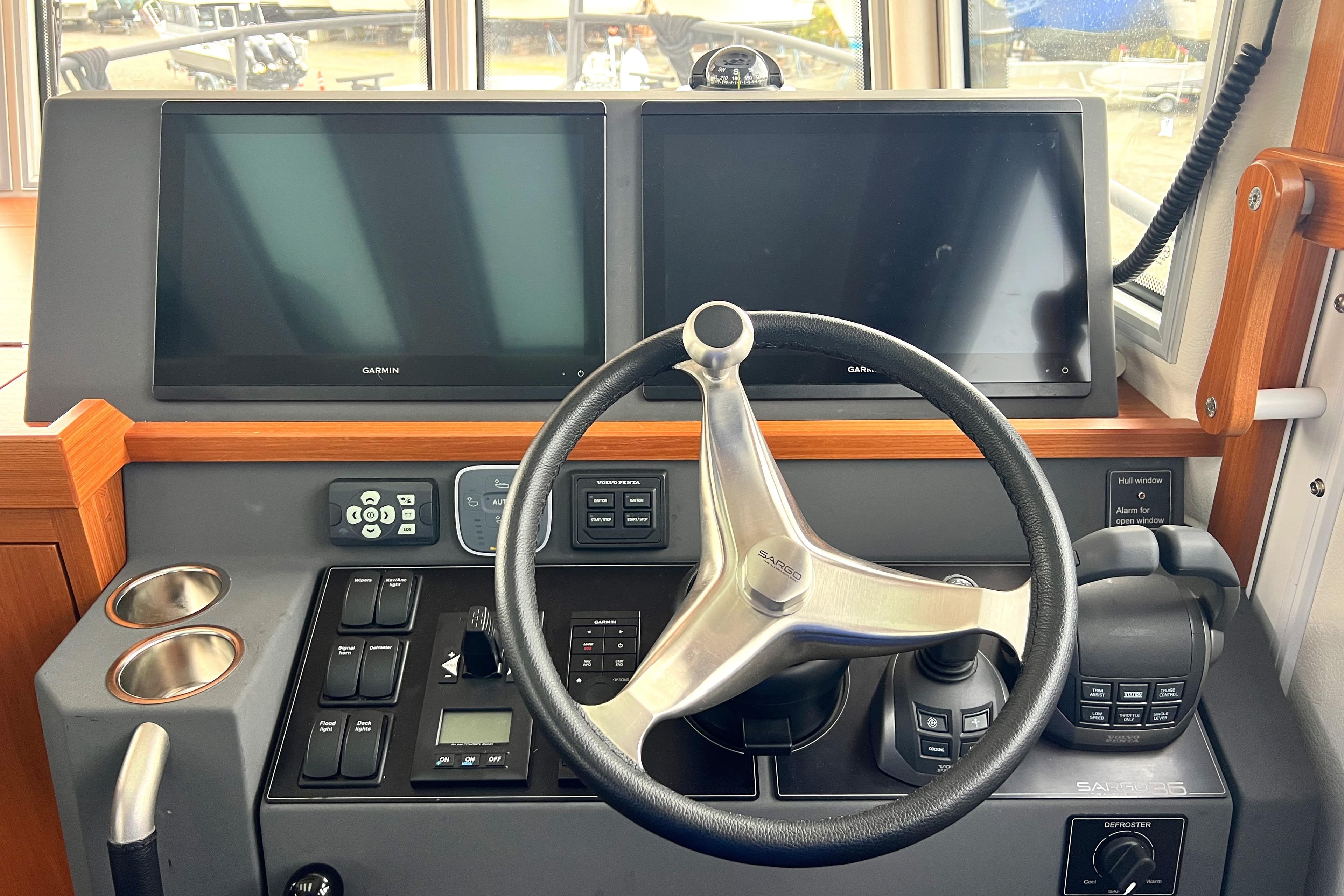 2024 Sargo 36 Explorer helm with dual screens and modern controls.