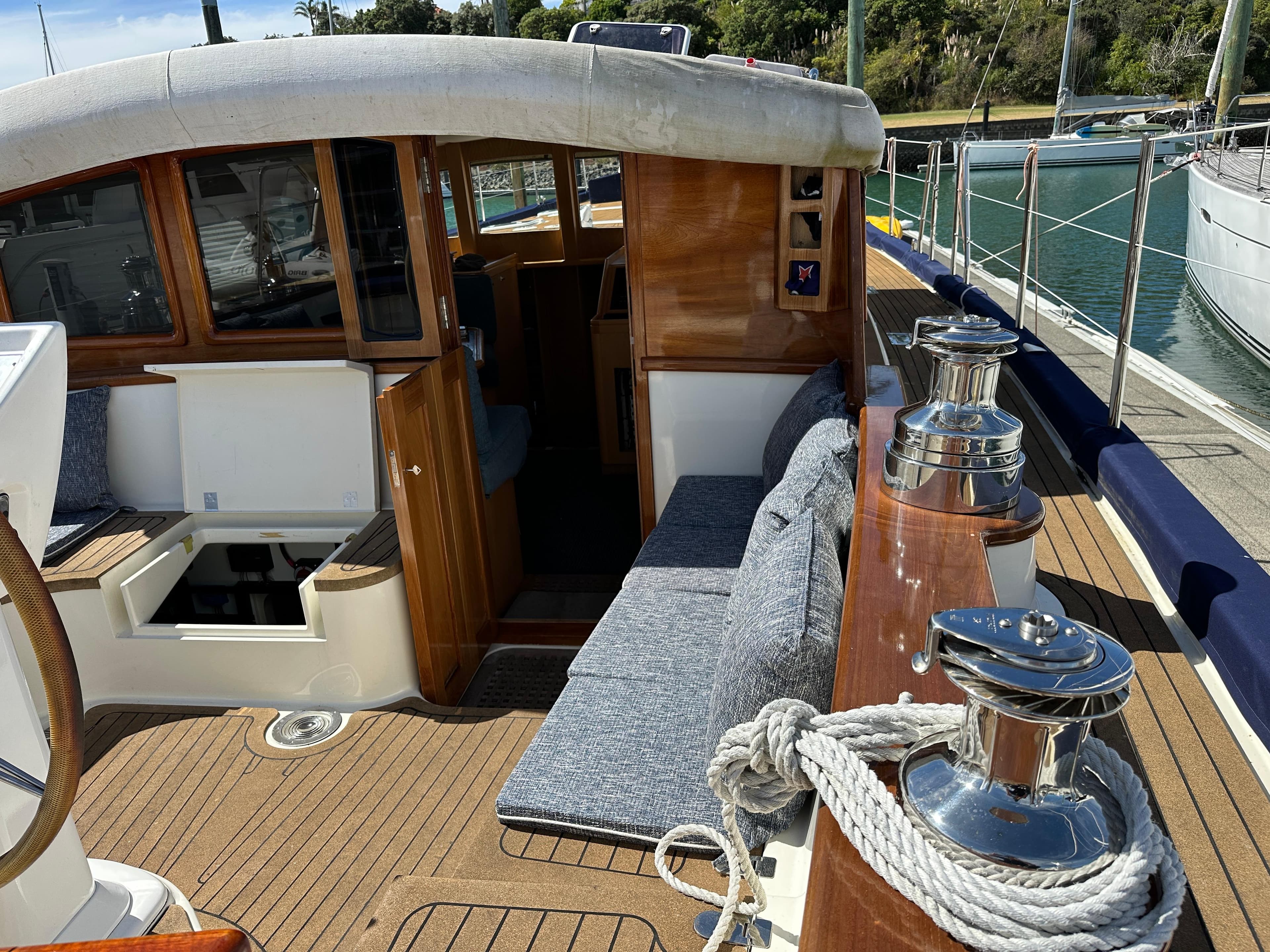 Luxurious 2022 Max Carter Custom Schooner deck with seating and polished fittings.