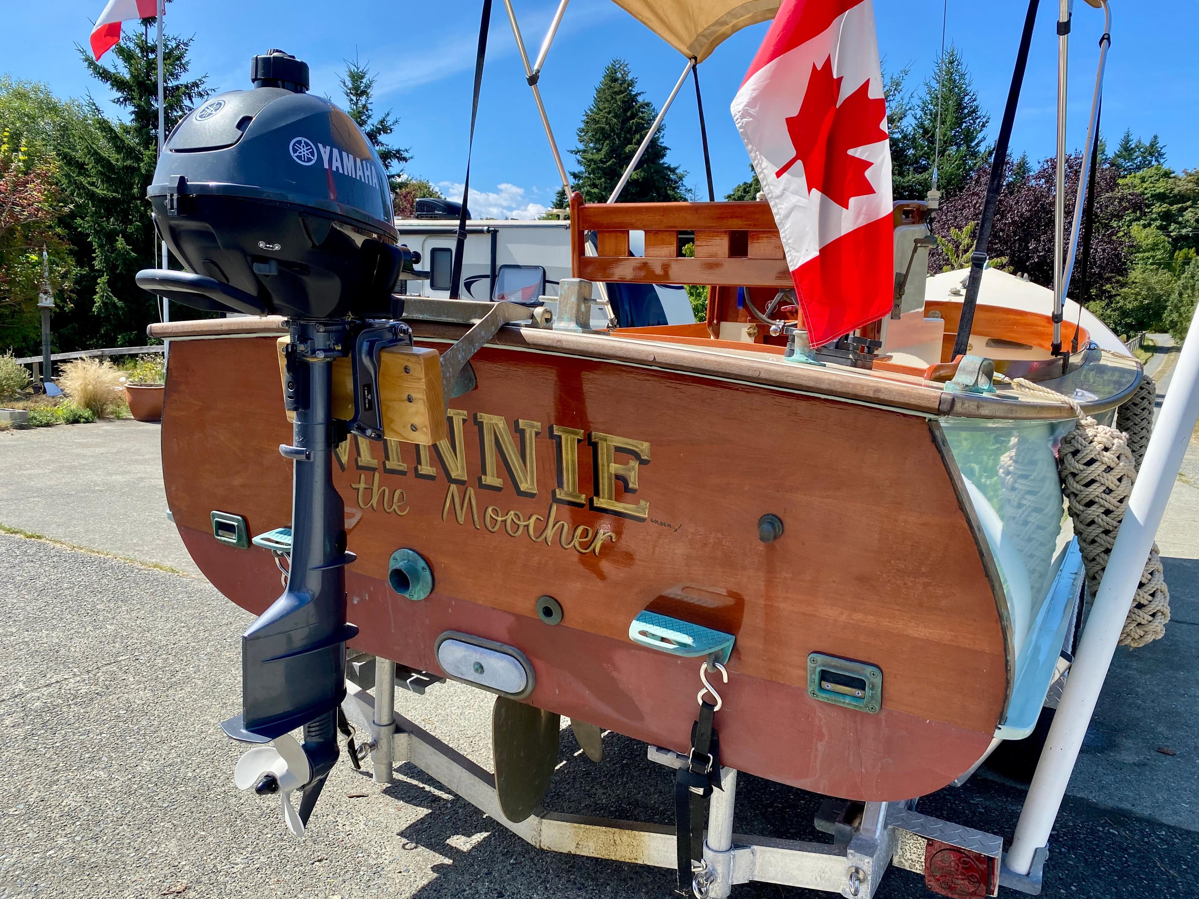 2014 Stimson Ocean Pointer Launch with Yamaha motor and Canadian flag displayed.