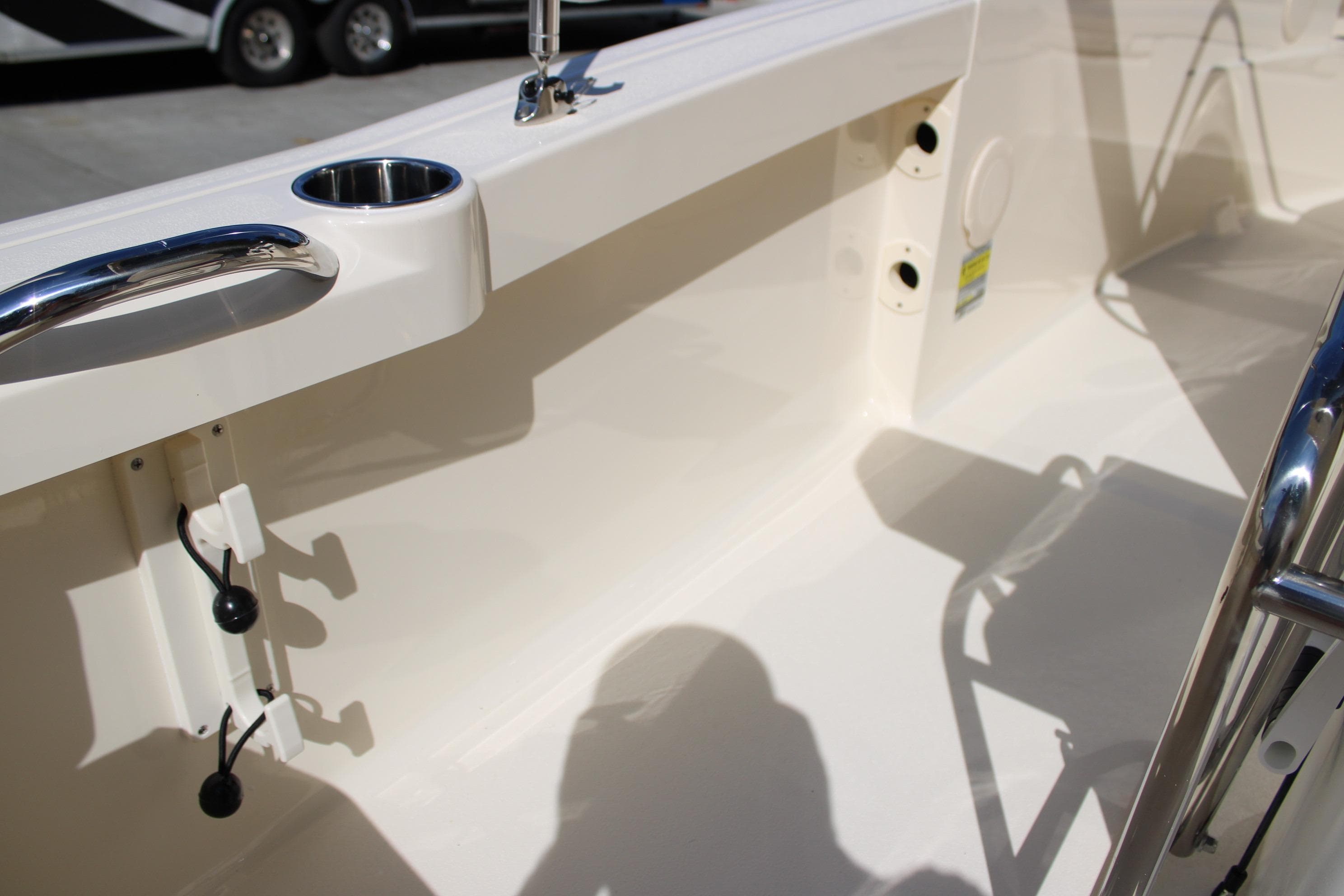 Interior view of 2026 Scout 188 Sportfish boat, featuring sleek design and stainless steel fixtures.