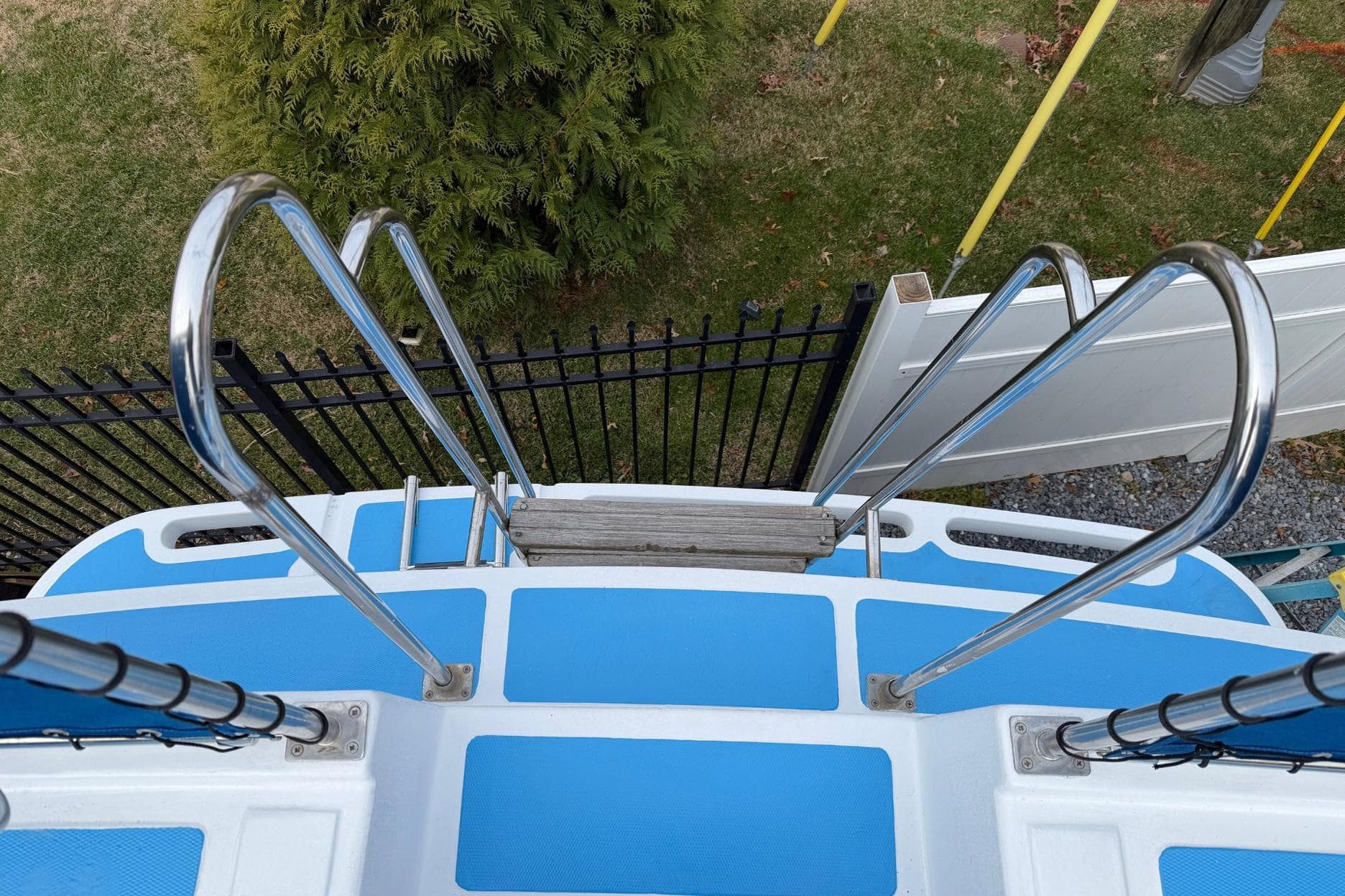 Stainless steel ladder on 1984 Golden Star 38 Trawler, viewed from above.