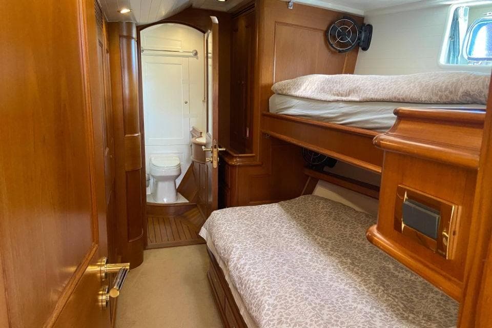Luxurious wooden cabin interior of 2002 Holland Jachtbouw Classic Hoek 82 yacht.