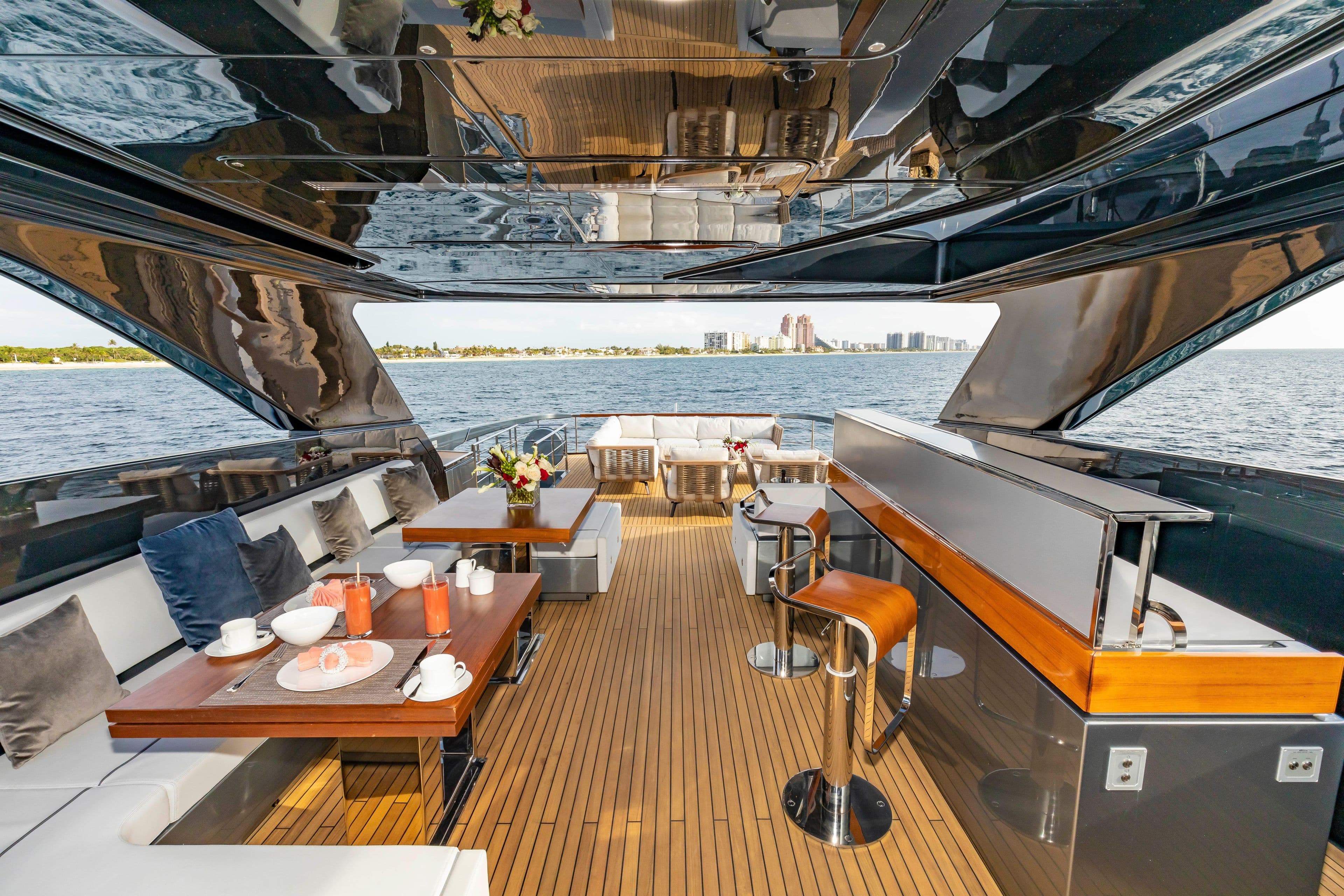 Luxurious 2020 Riva 110' Dolcevita yacht deck with elegant seating and ocean view.