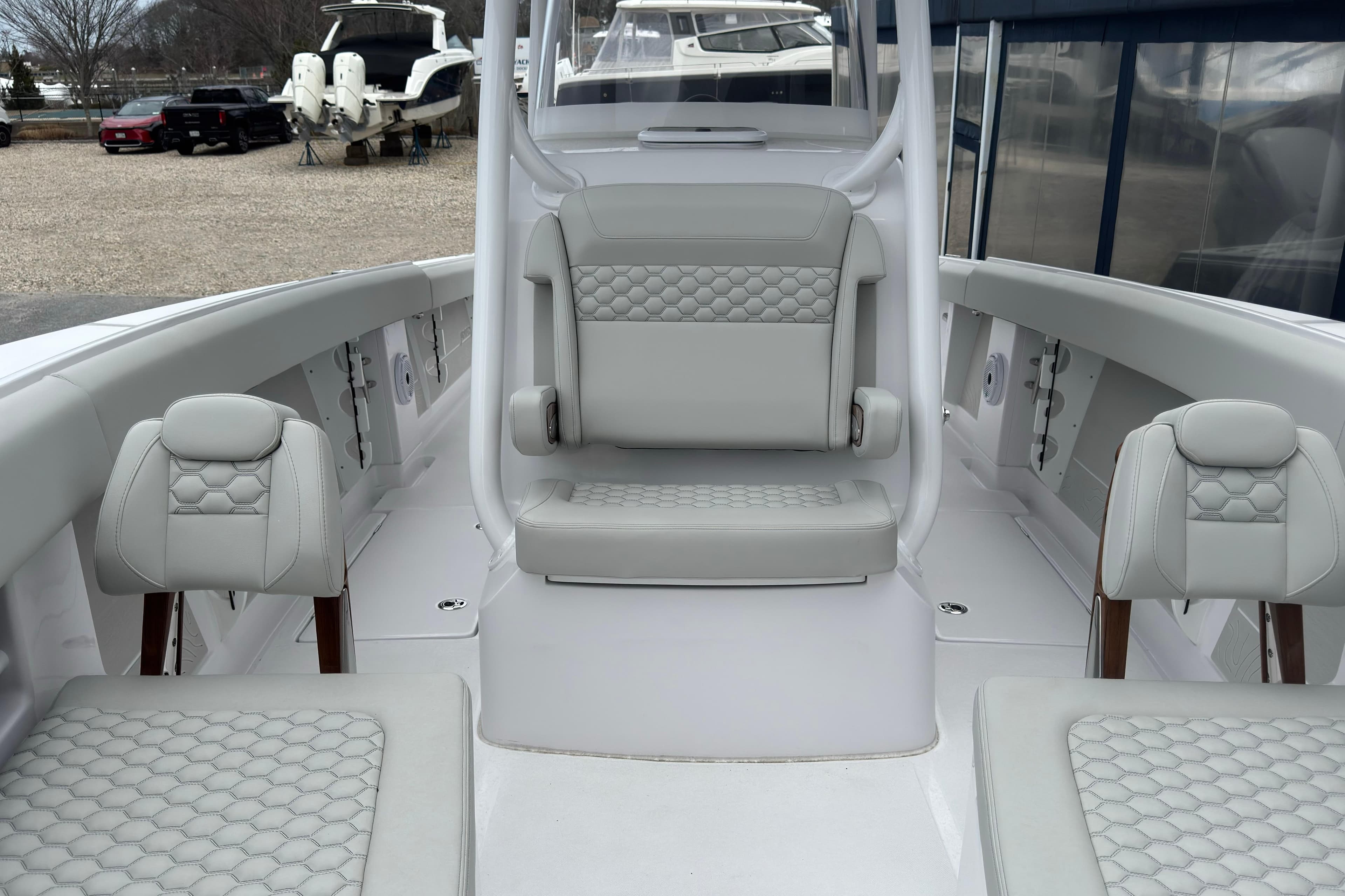 Interior of a 2026 Jupiter 30 boat with luxurious seating and modern design.