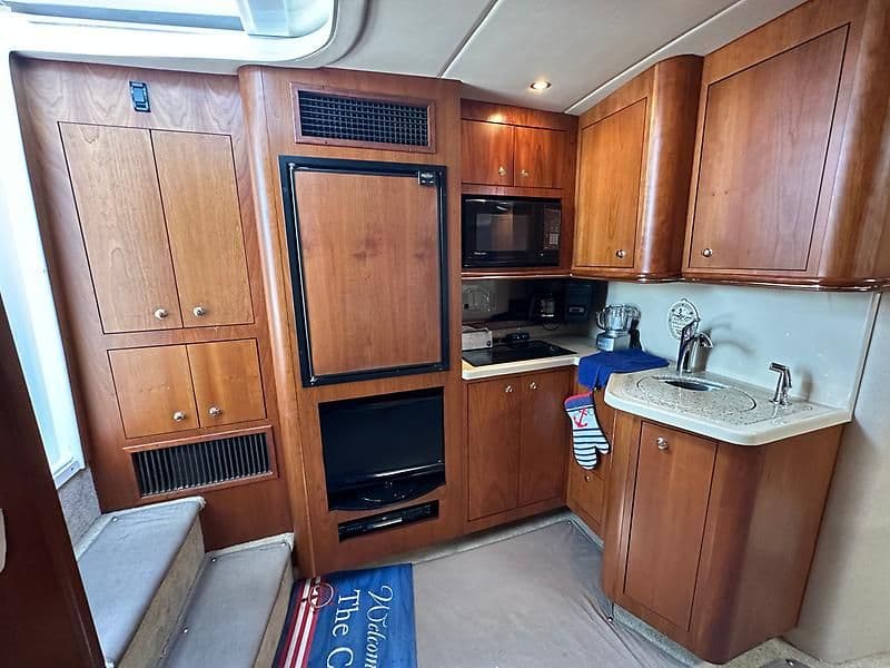 Interior of 2003 Cruisers Yachts 3772 Express with kitchen.