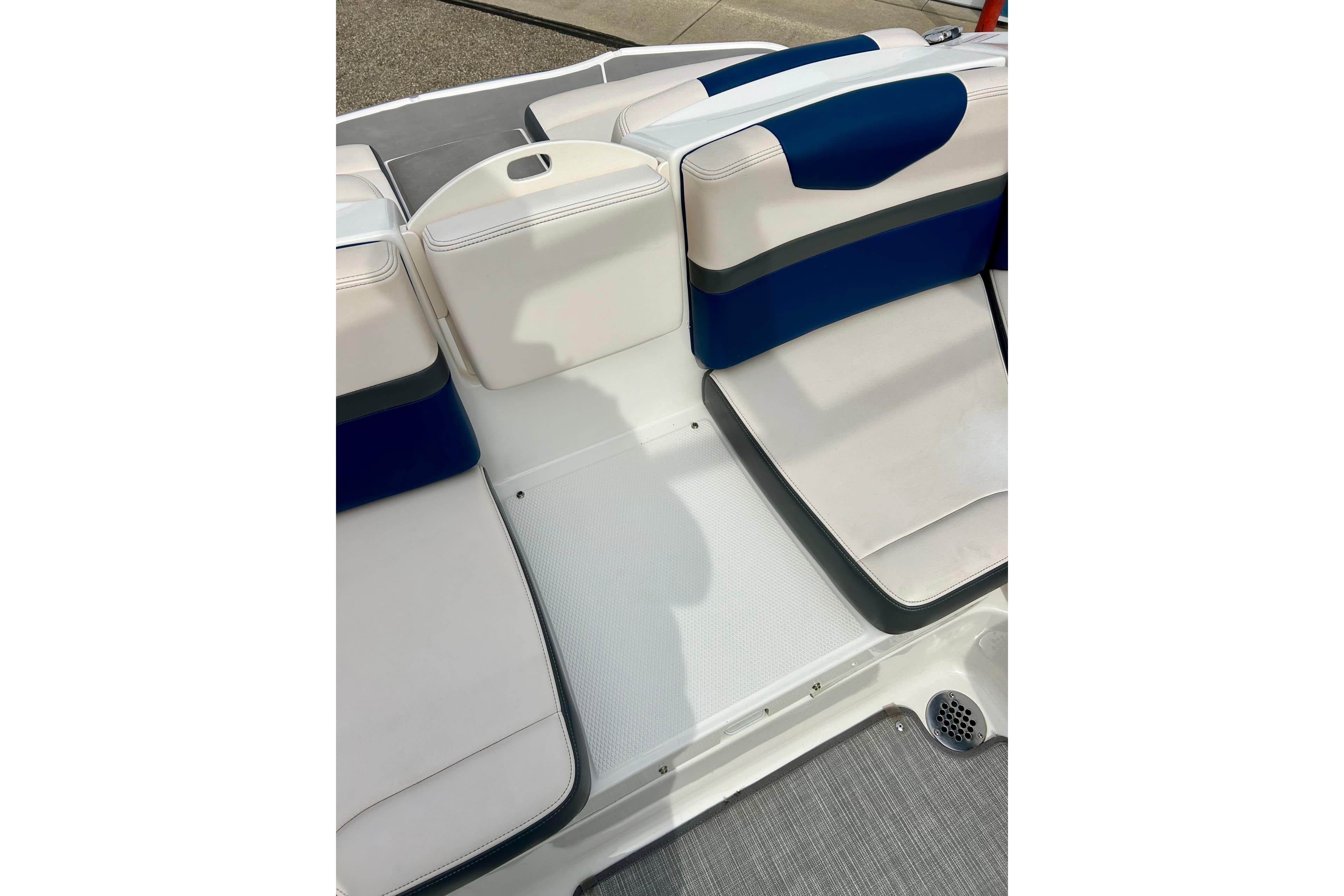 2017 Chaparral 203 Vortex boat interior seating with blue and white upholstery.