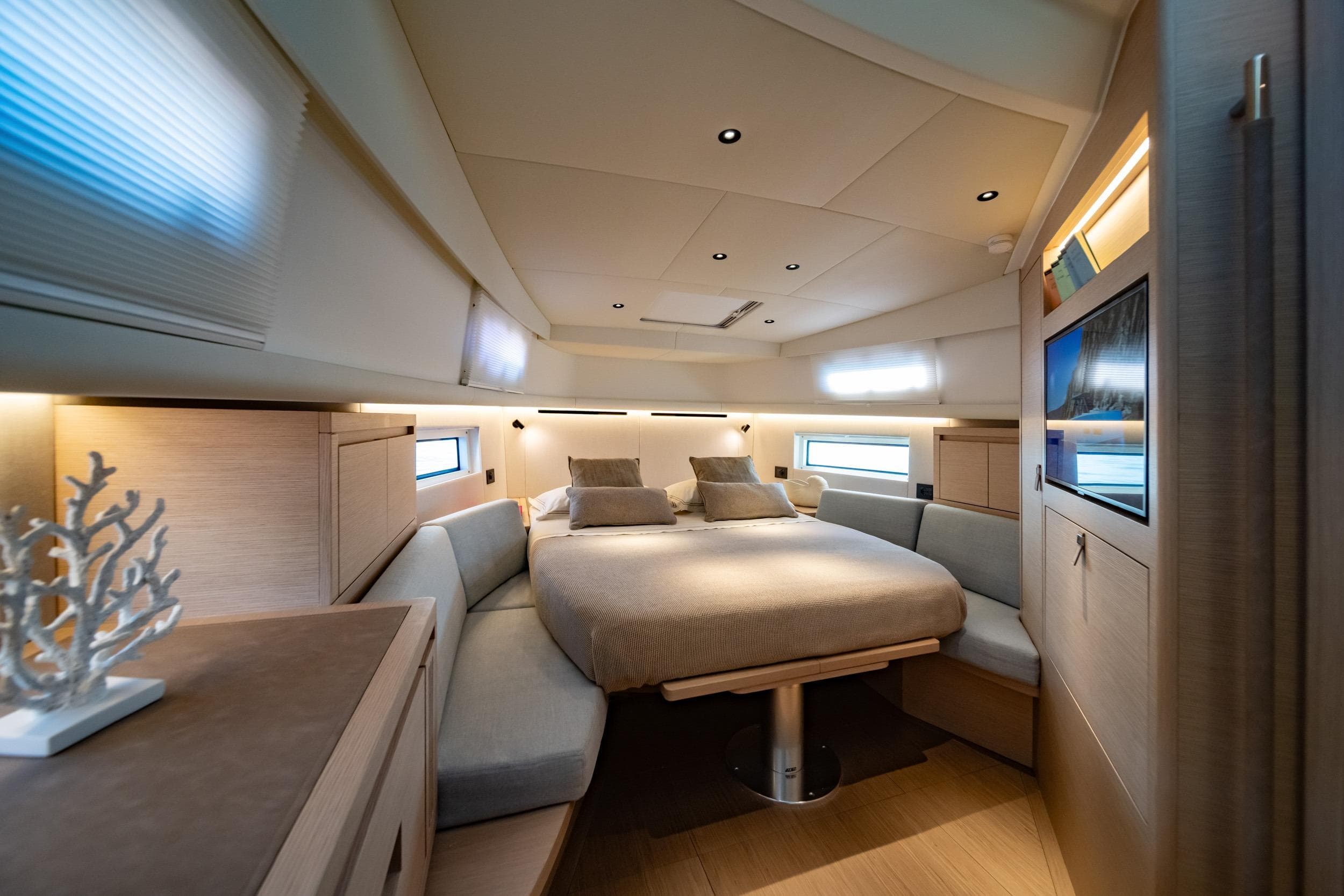 Luxurious interior of 2026 Pardo Yachts P43, featuring a cozy bedroom with modern design.