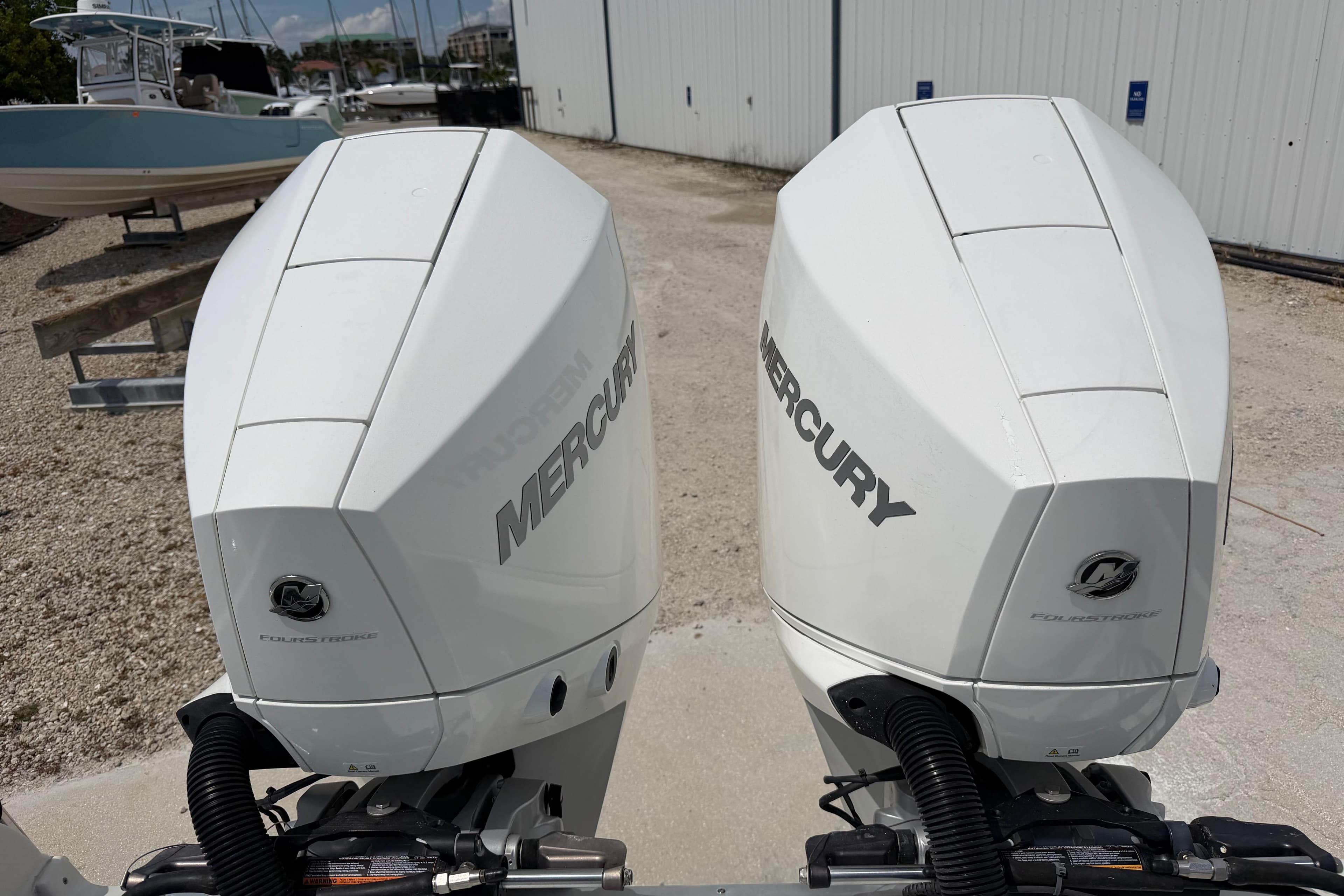 Twin Mercury outboard engines on a 2019 Crownline Eclipse E295 XS boat.