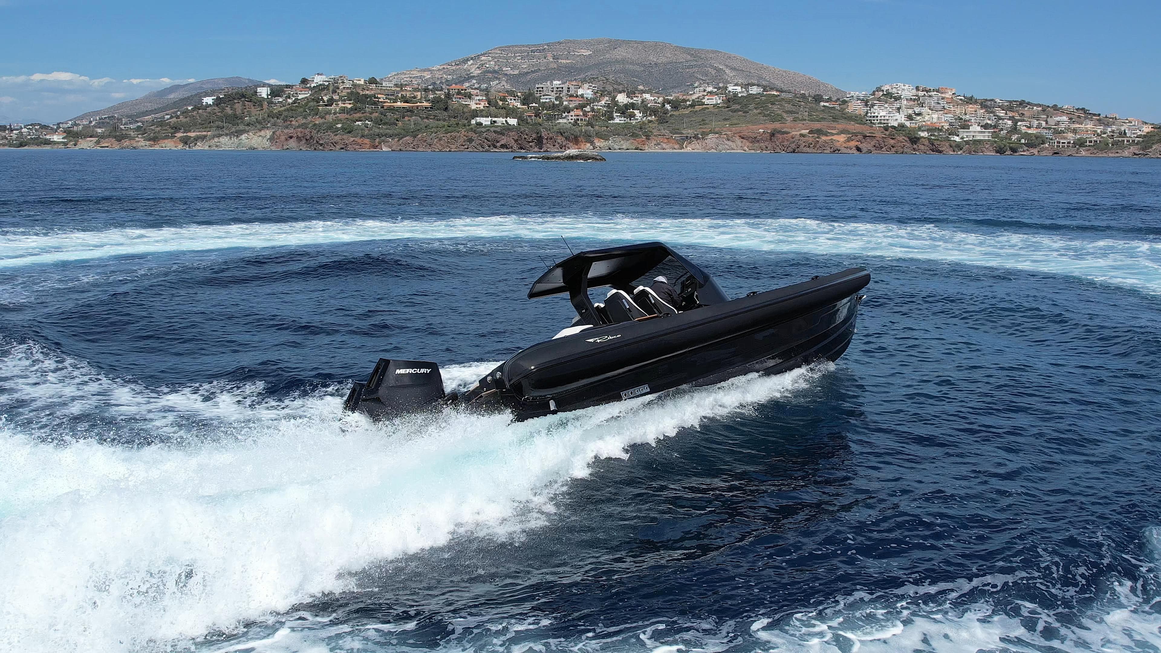 2024 Ribco Seafarer 36X boat cruising on open water with scenic coastal backdrop.
