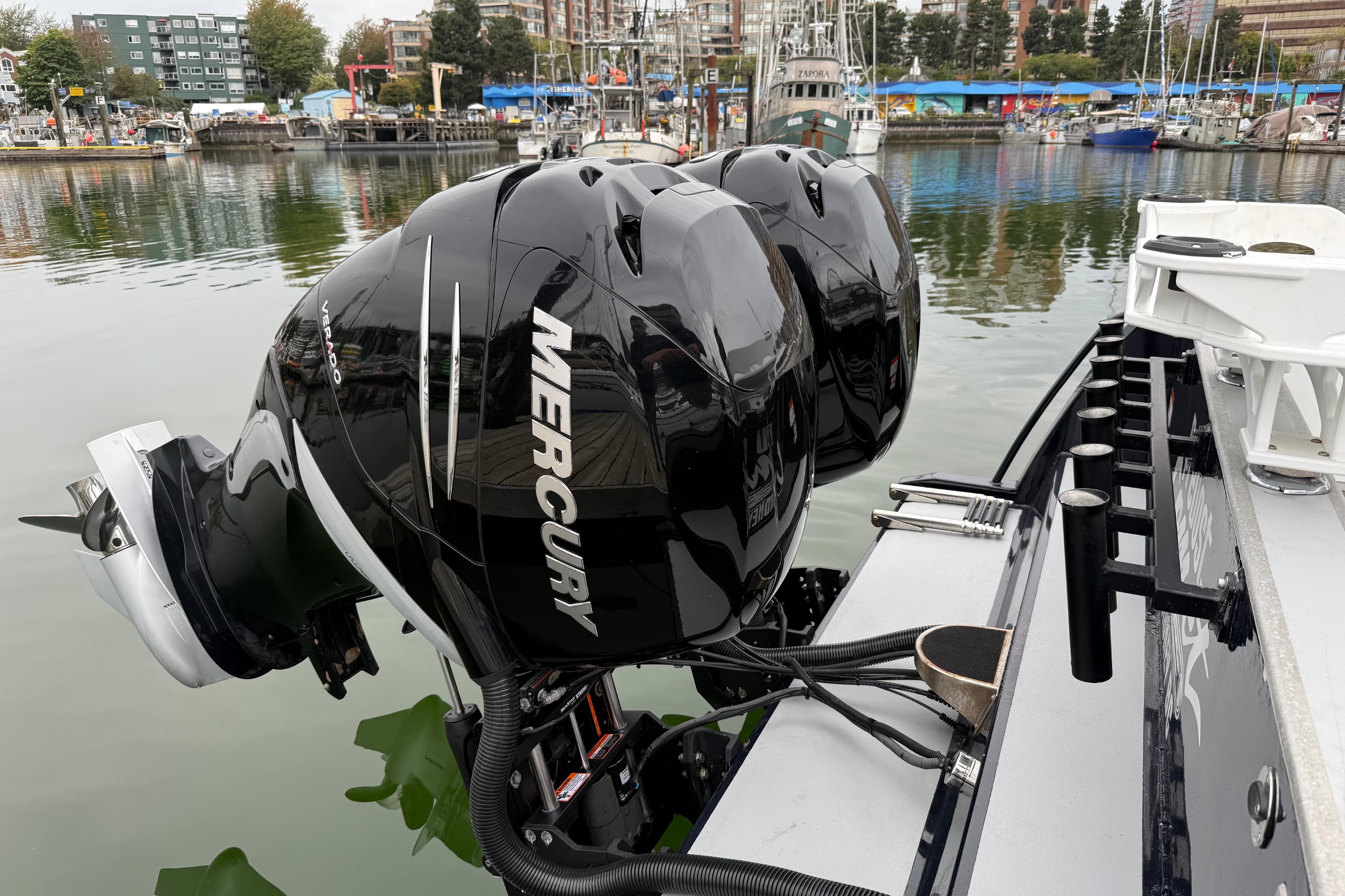 2018 Coastal Craft 30 Profish with dual Mercury outboard engines docked in a marina.