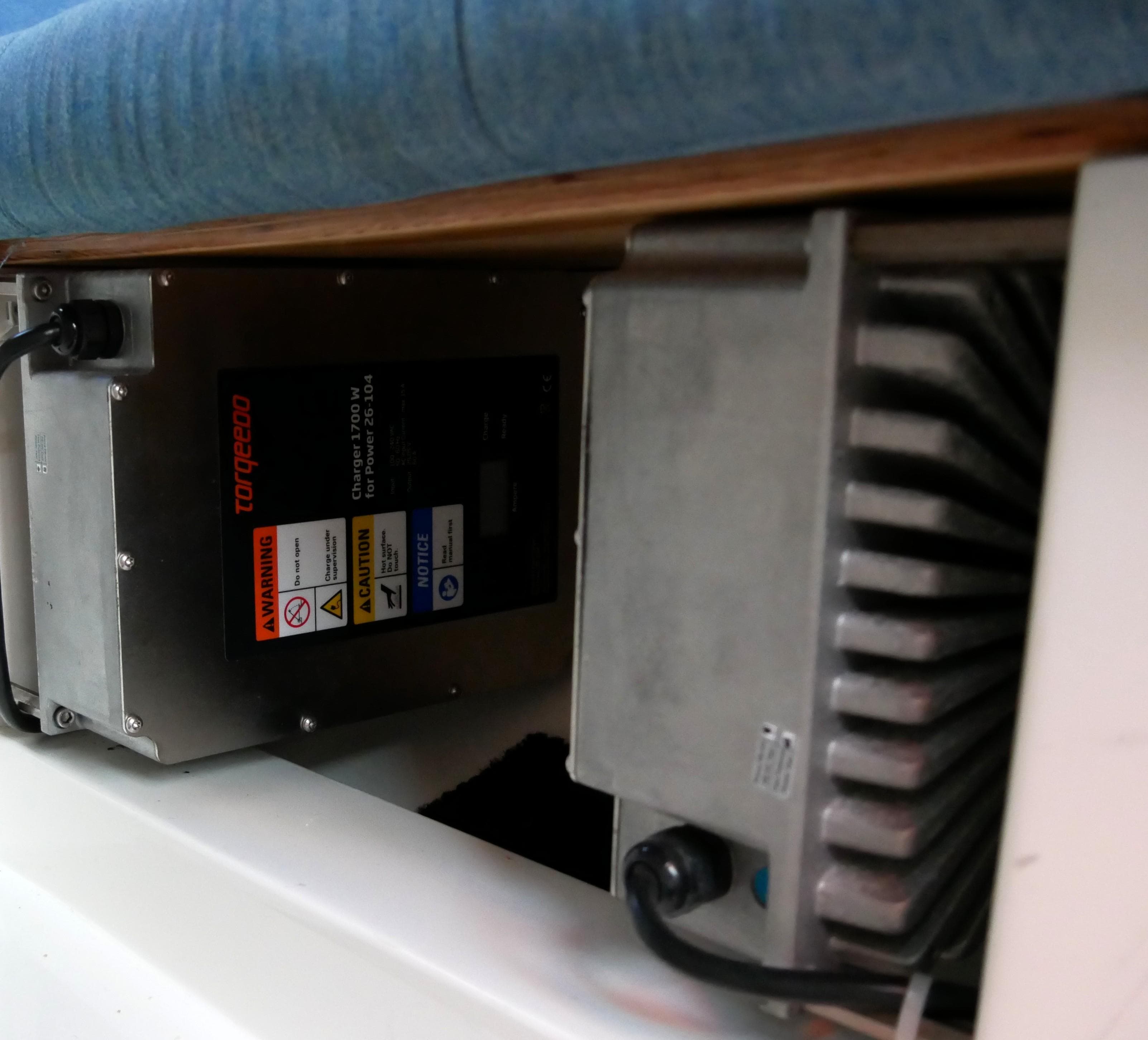 Under-seat battery charger in a 2016 Bente 24 boat.