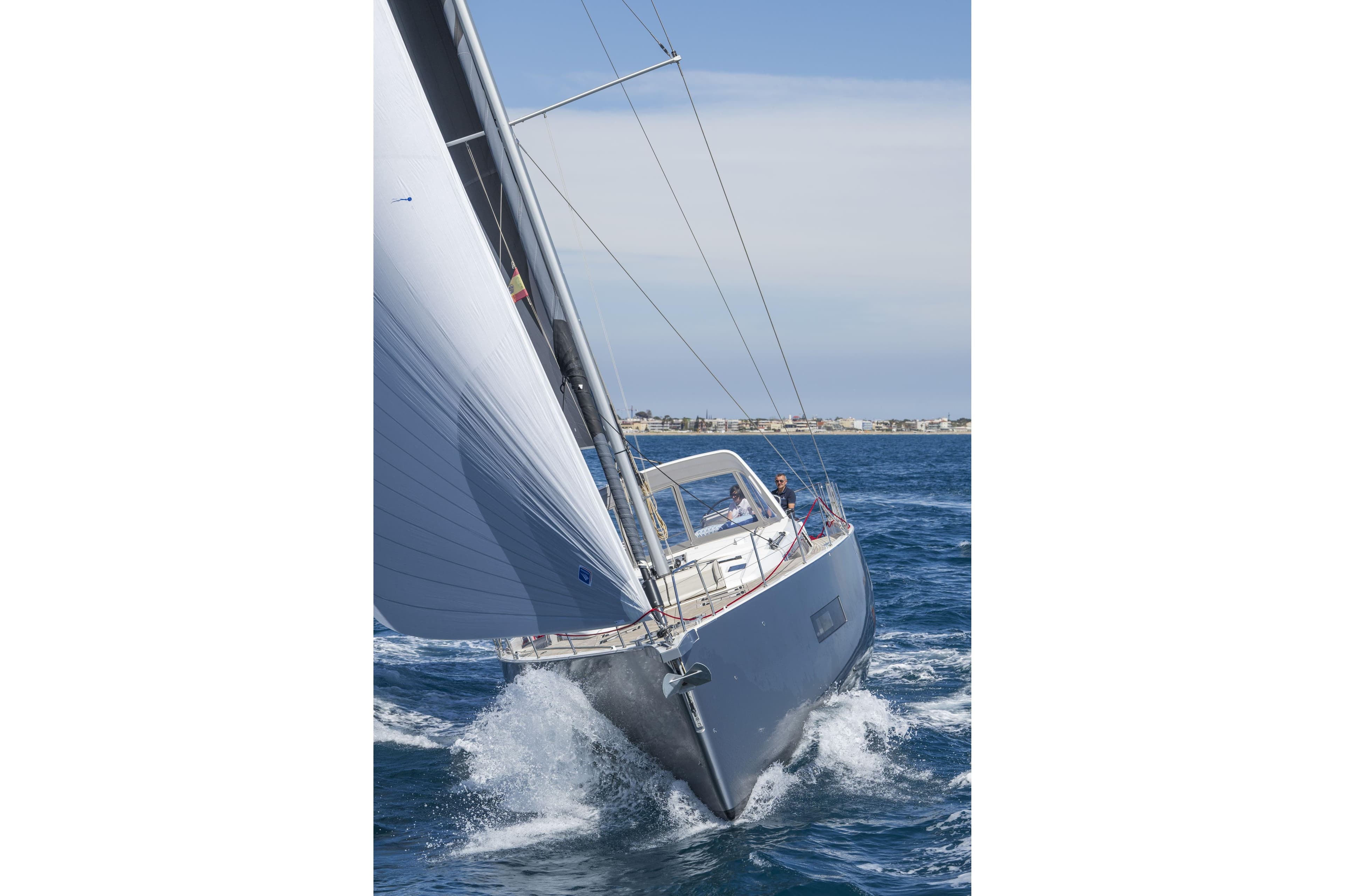 2023 Beneteau Oceanis Yacht 60 sailing on open water, showcasing sleek design and performance.