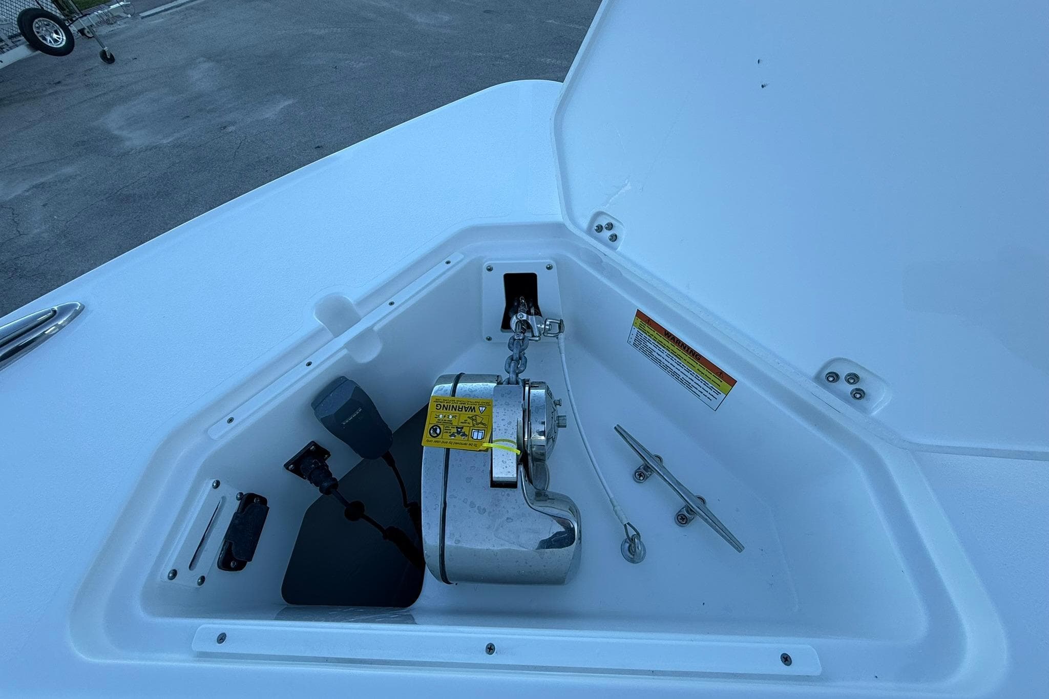 Anchor compartment of 2026 Crevalle 33 CSF boat, featuring chain and cleat.