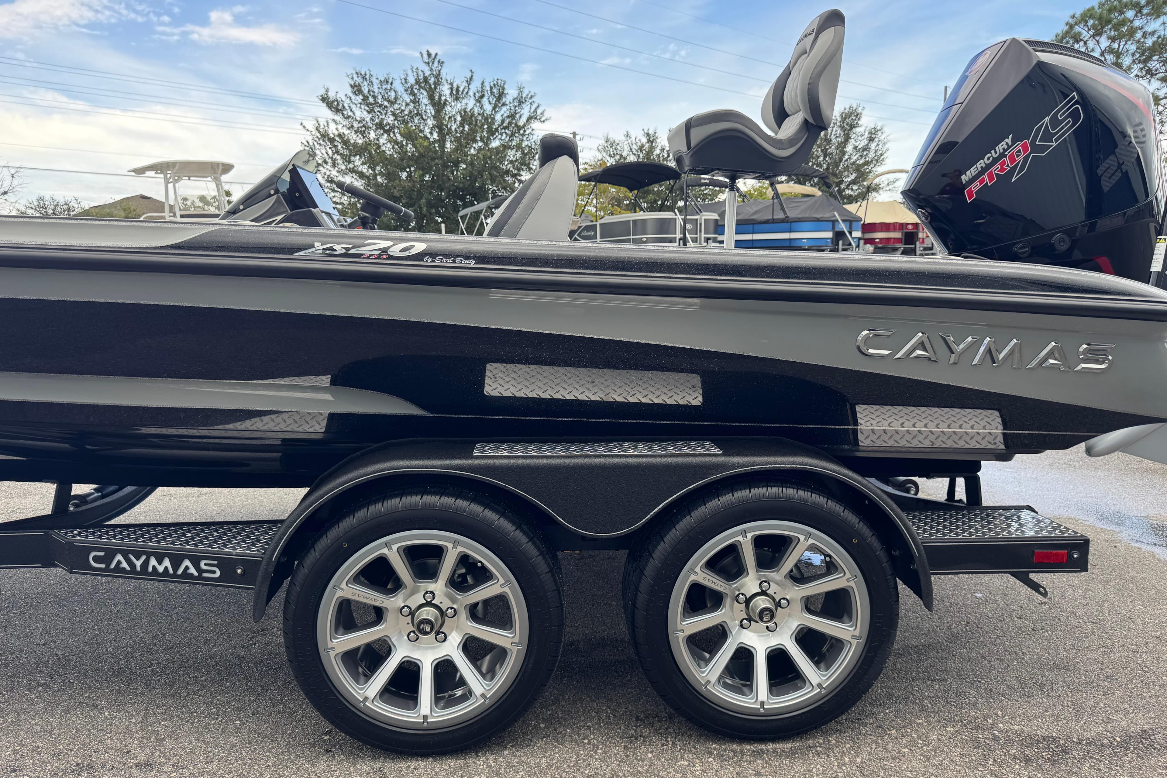 2026 Caymas XS 20 Pro boat on trailer, featuring sleek design and Mercury Pro XS engine.