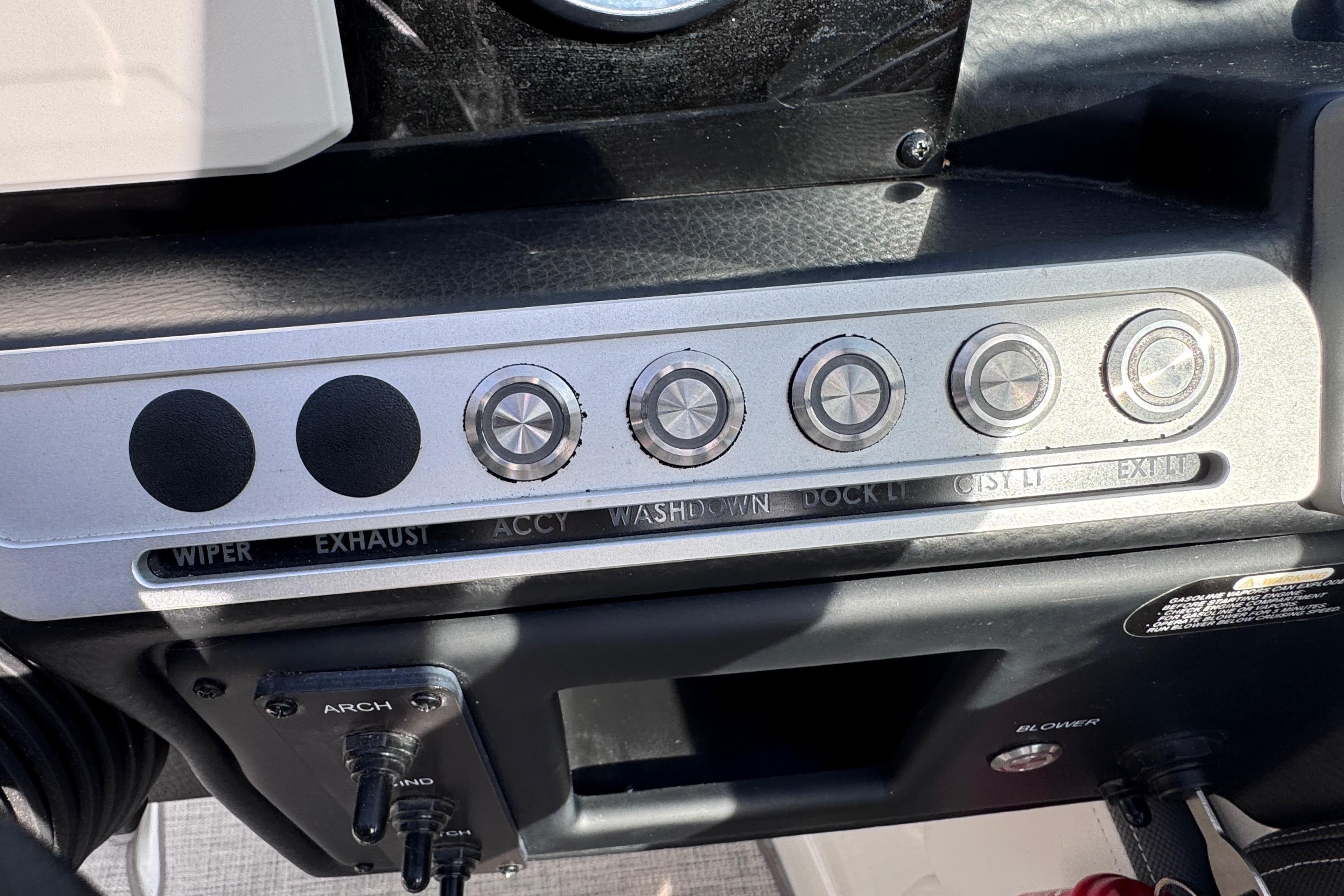Control panel of a 2022 Crownline 265 SS boat with labeled buttons.