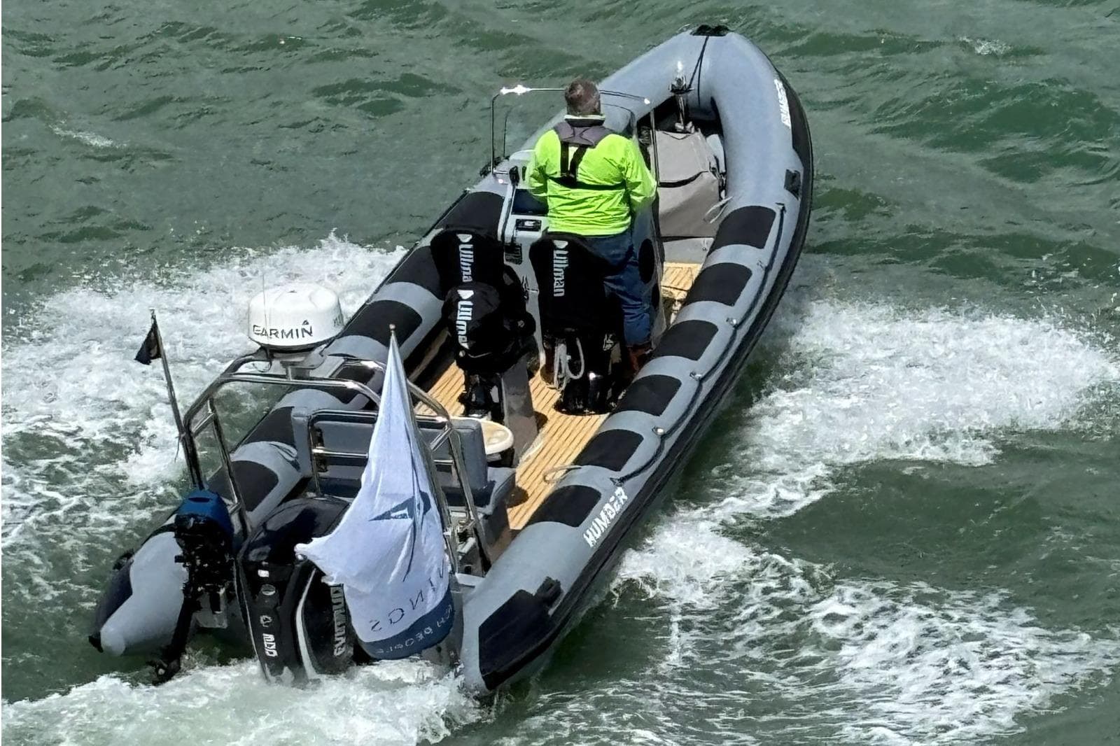 2021 Humber Ocean Pro 8 boat navigating through water with Garmin equipment.