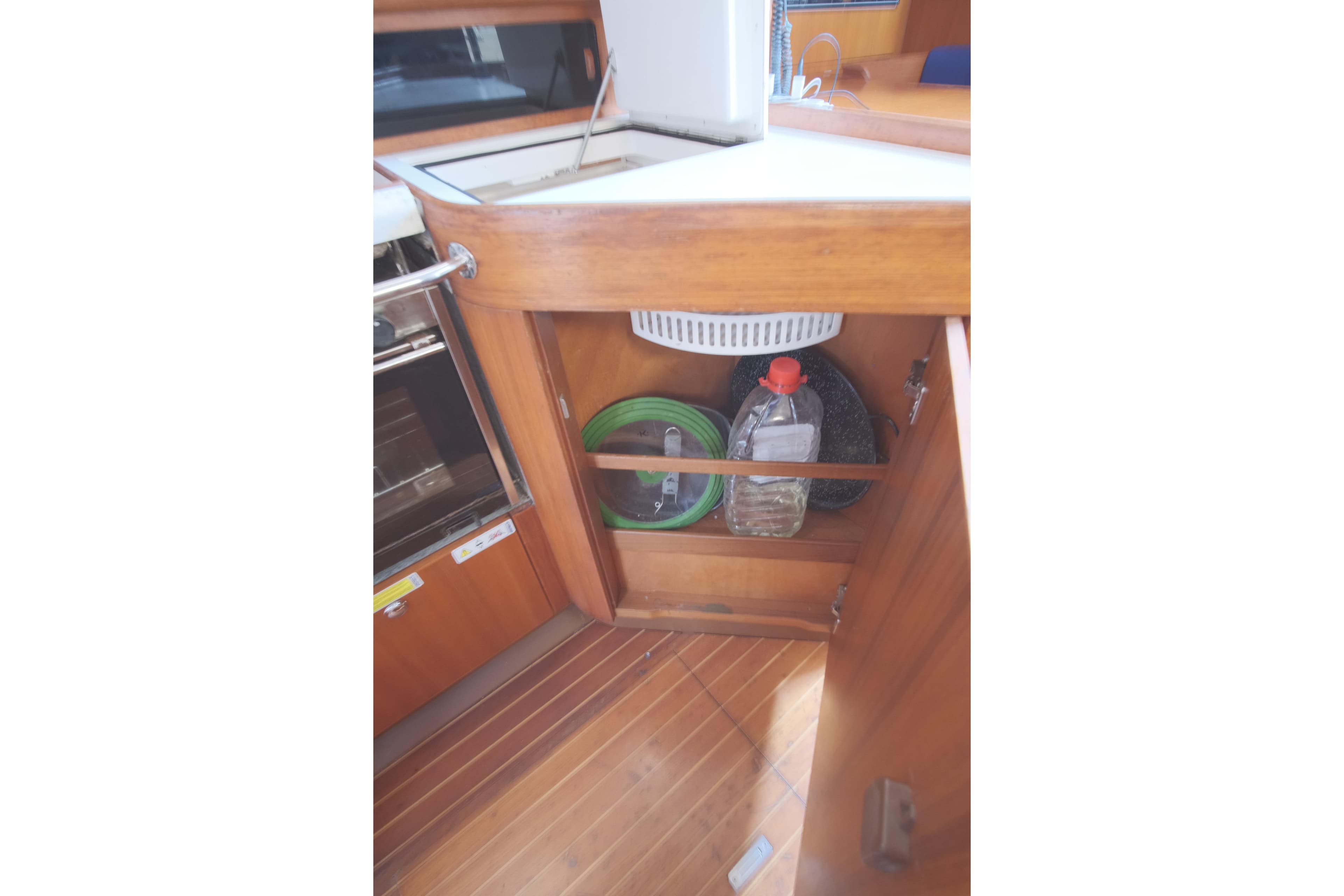 Interior of 2000 X-Yachts 442 MK II showing wooden cabinet storage.