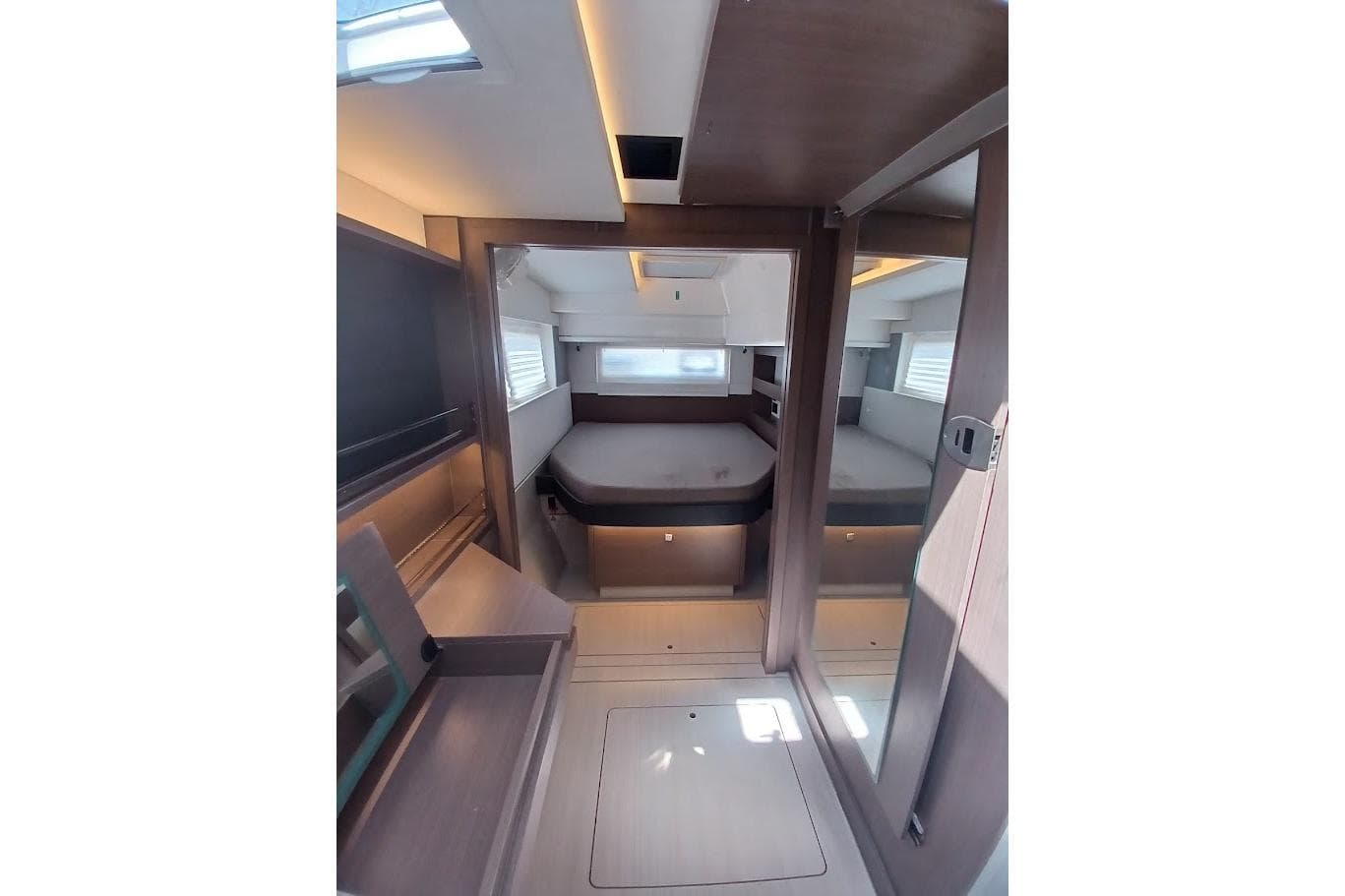 Modern interior of 2022 Leopard 42 yacht cabin with sleek design and ample lighting.