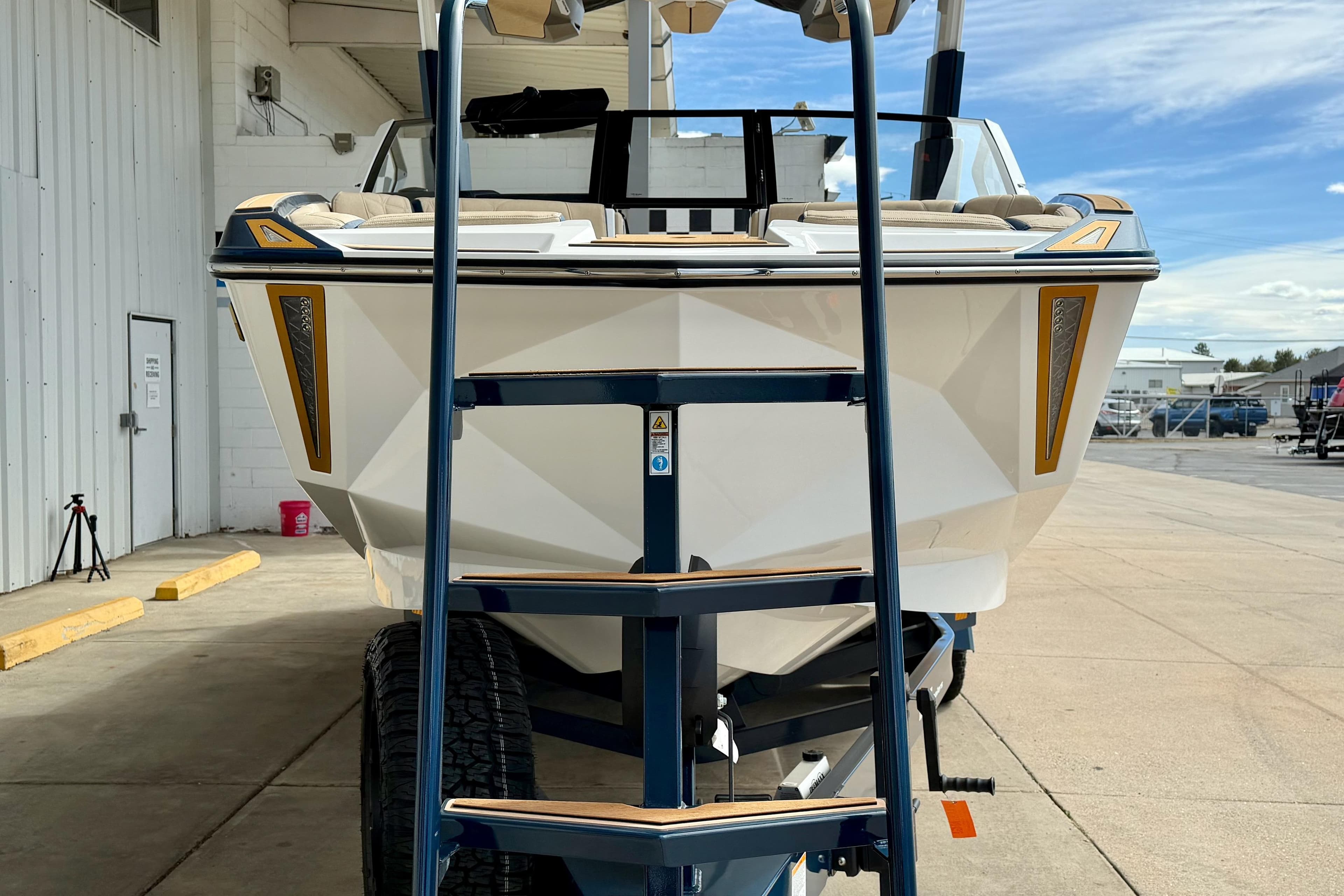2025 Nautique Super Air Nautique G25 Paragon boat on trailer, viewed from the front.