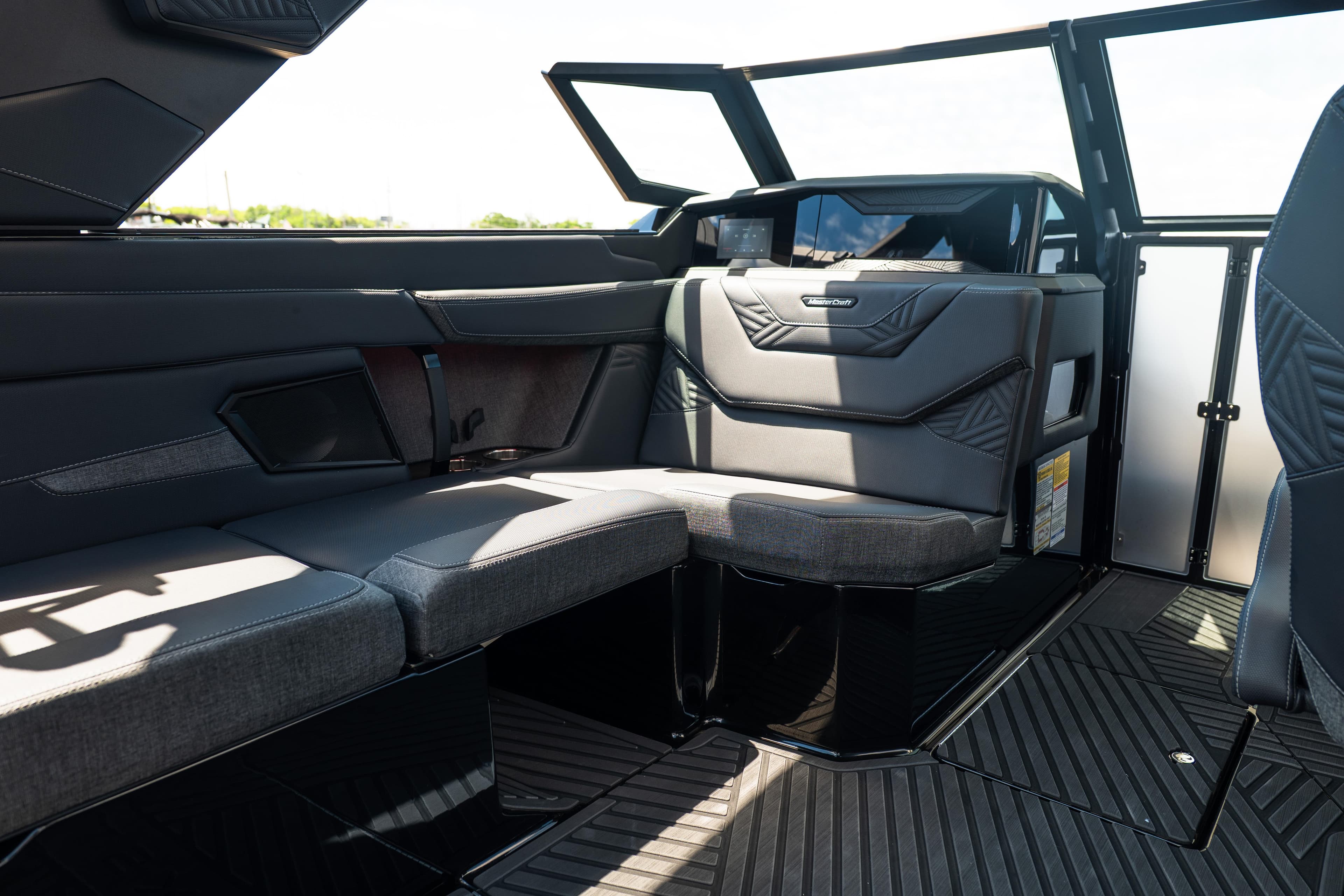 Interior of 2026 MasterCraft XStar 25 boat with sleek, modern seating design.