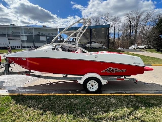 2004 Yamaha Boats AR 210 in red and white on a trailer.