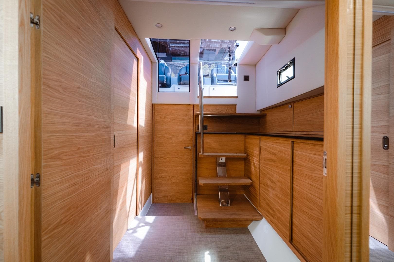 Luxurious interior of 2026 De Antonio Yachts 50 Open, featuring elegant wooden finishes and modern design.