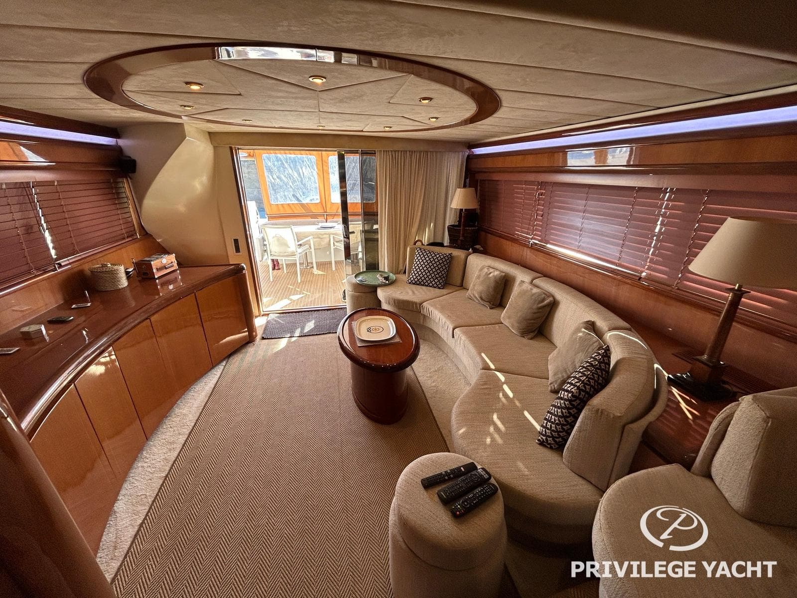 Luxurious interior of 1993 Raffaelli AMC22 yacht with elegant seating and wooden accents.