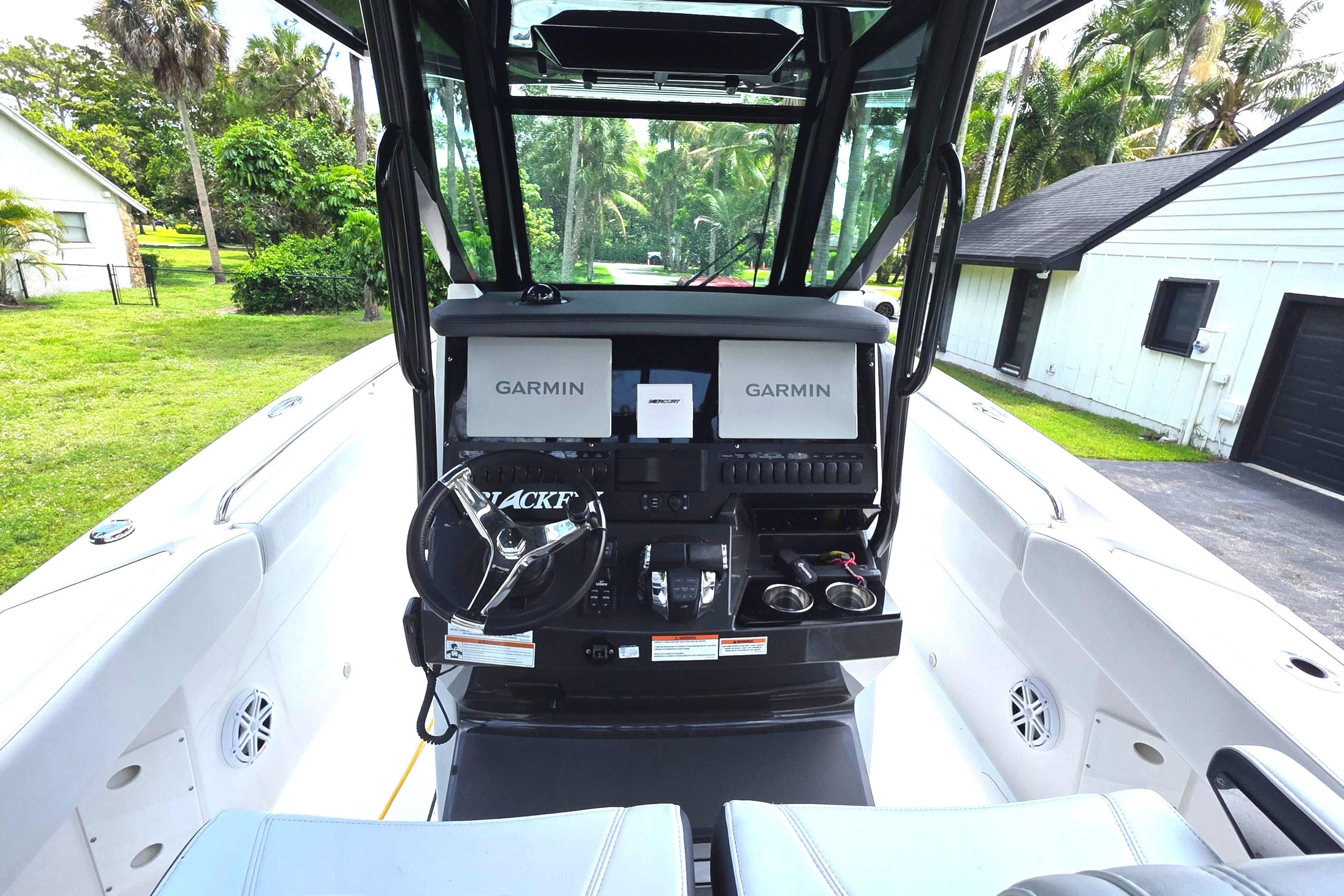 Interior view of 2021 Blackfin 272 CC with Garmin navigation.