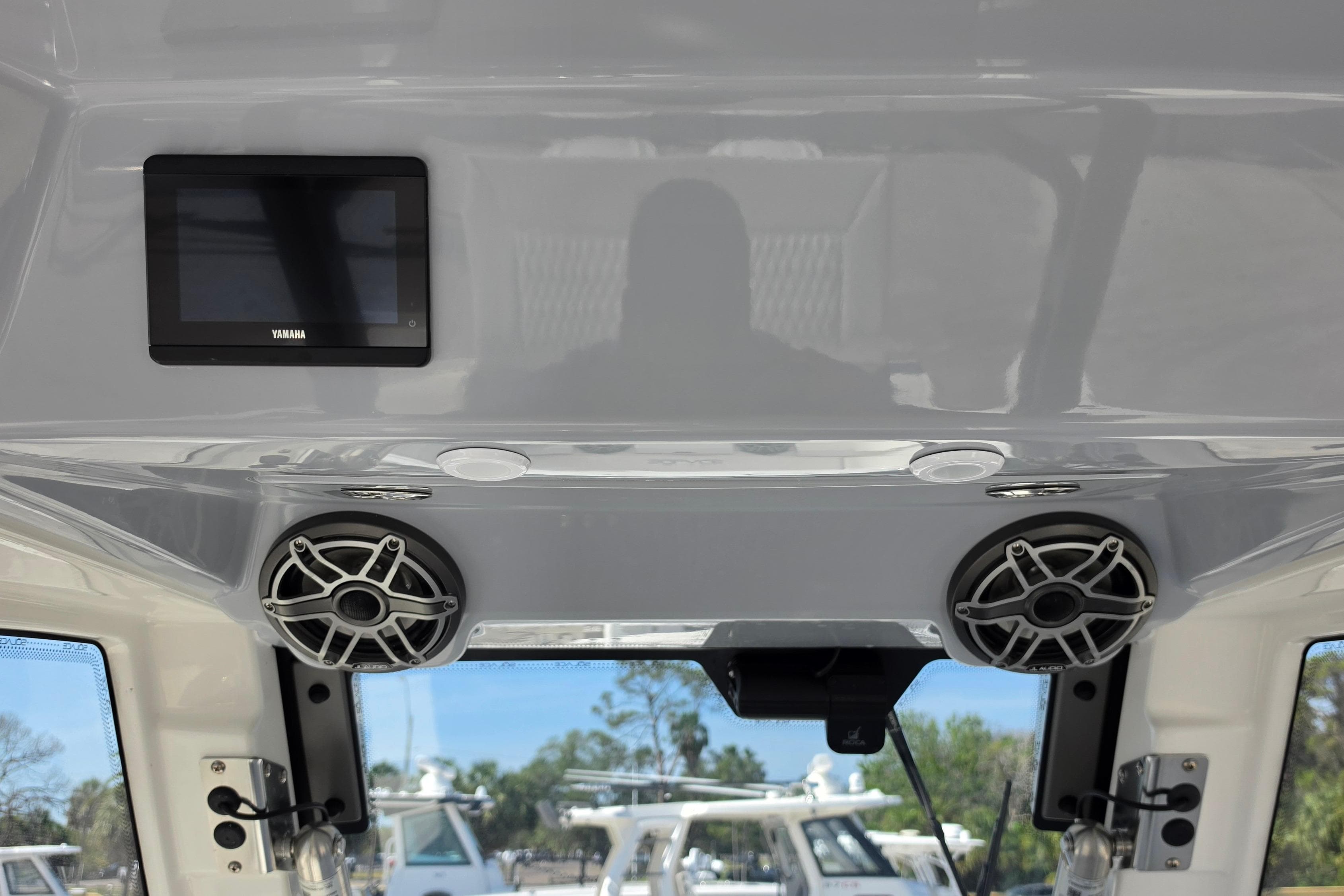 Interior of 2026 Solace 30CS boat featuring Yamaha display and speakers.