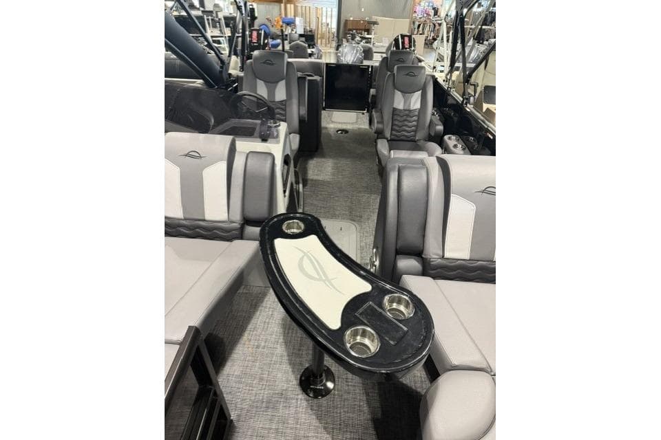 2026 SunCatcher Elite 322SR boat interior with luxurious seating and modern design.