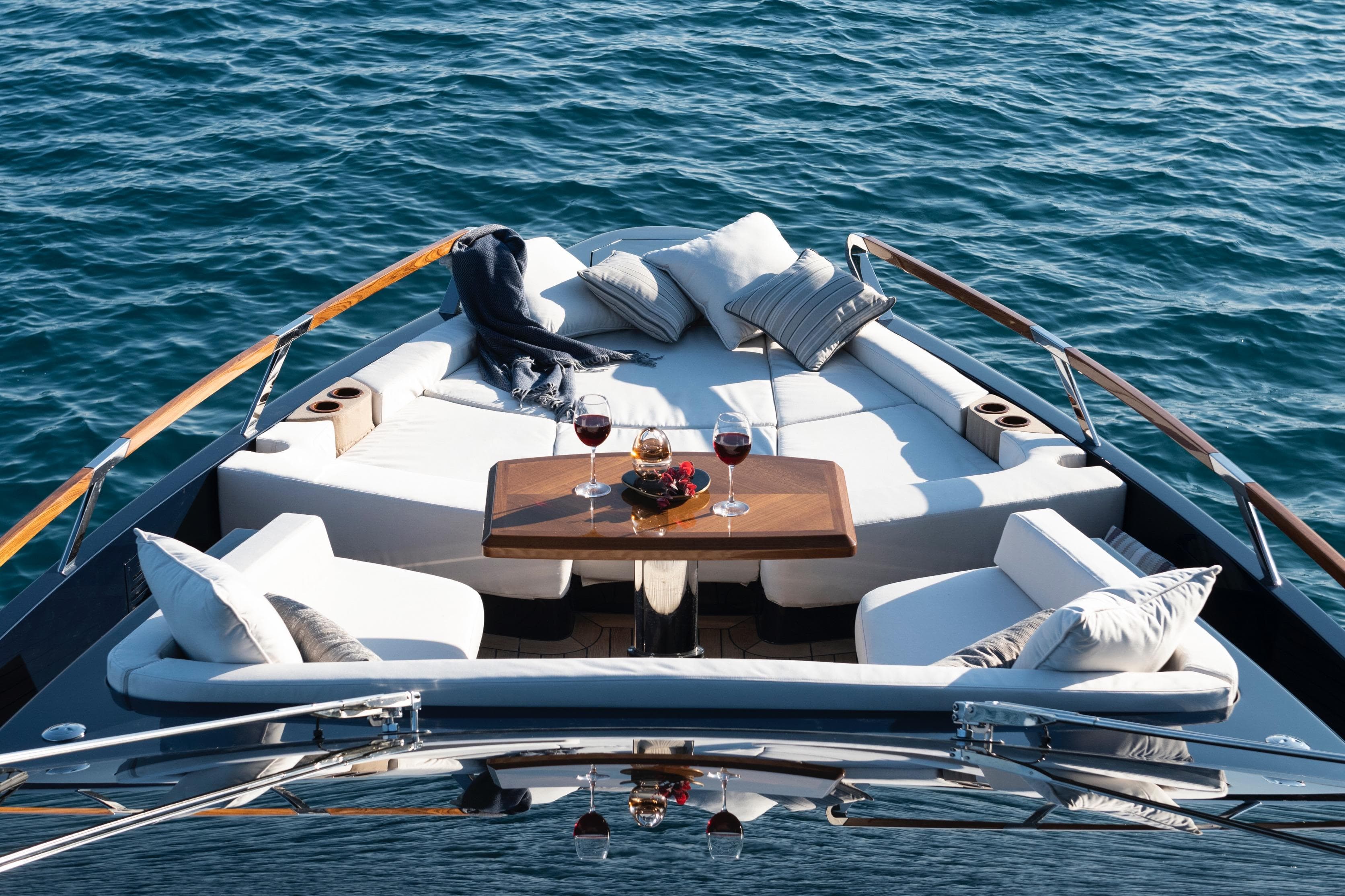 Luxurious 2027 Lazzara LSX 67 yacht deck with elegant seating and ocean view.