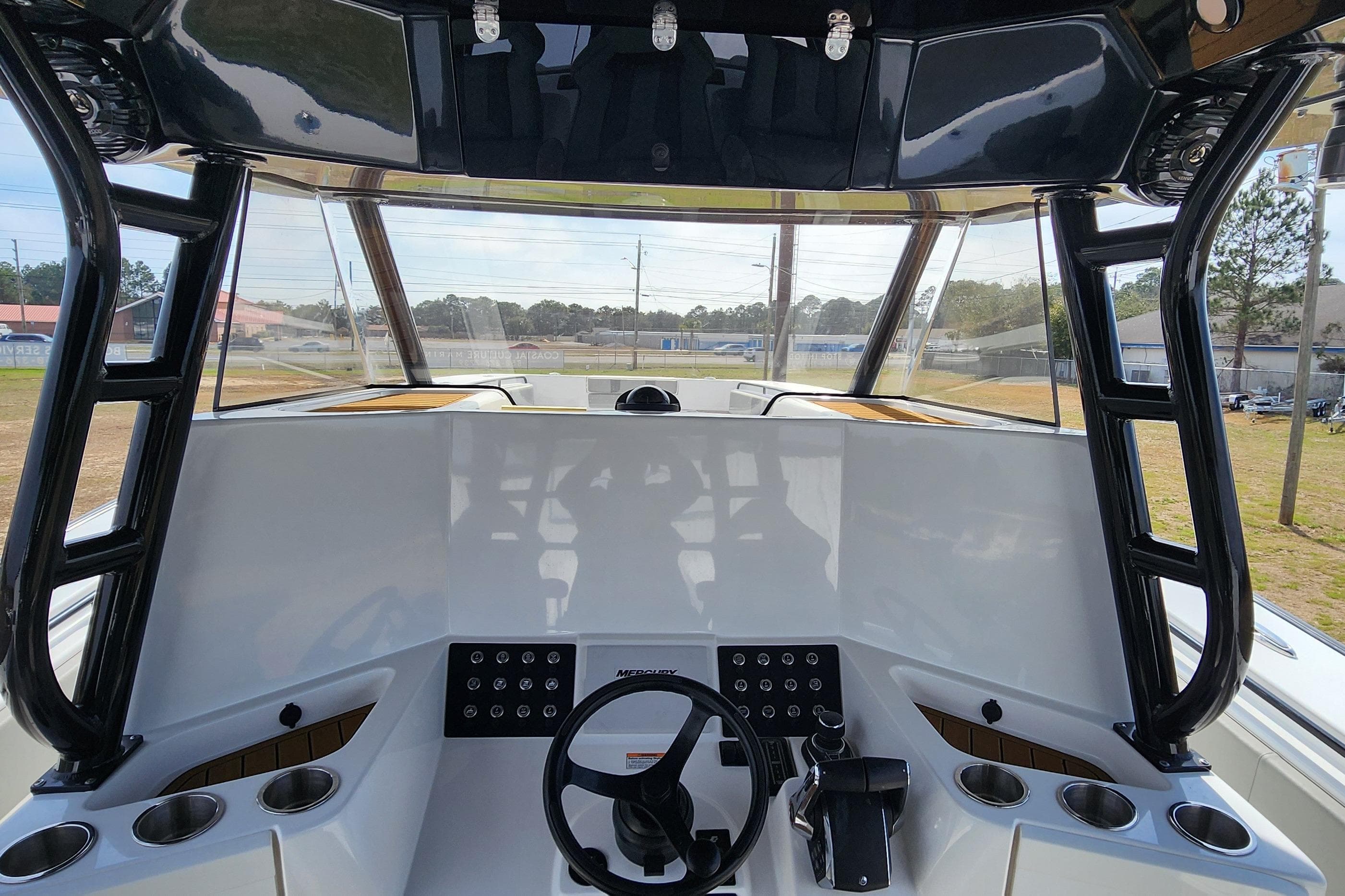 Cockpit of 2025 Cape Horn Yachts 47, featuring modern controls and steering wheel.