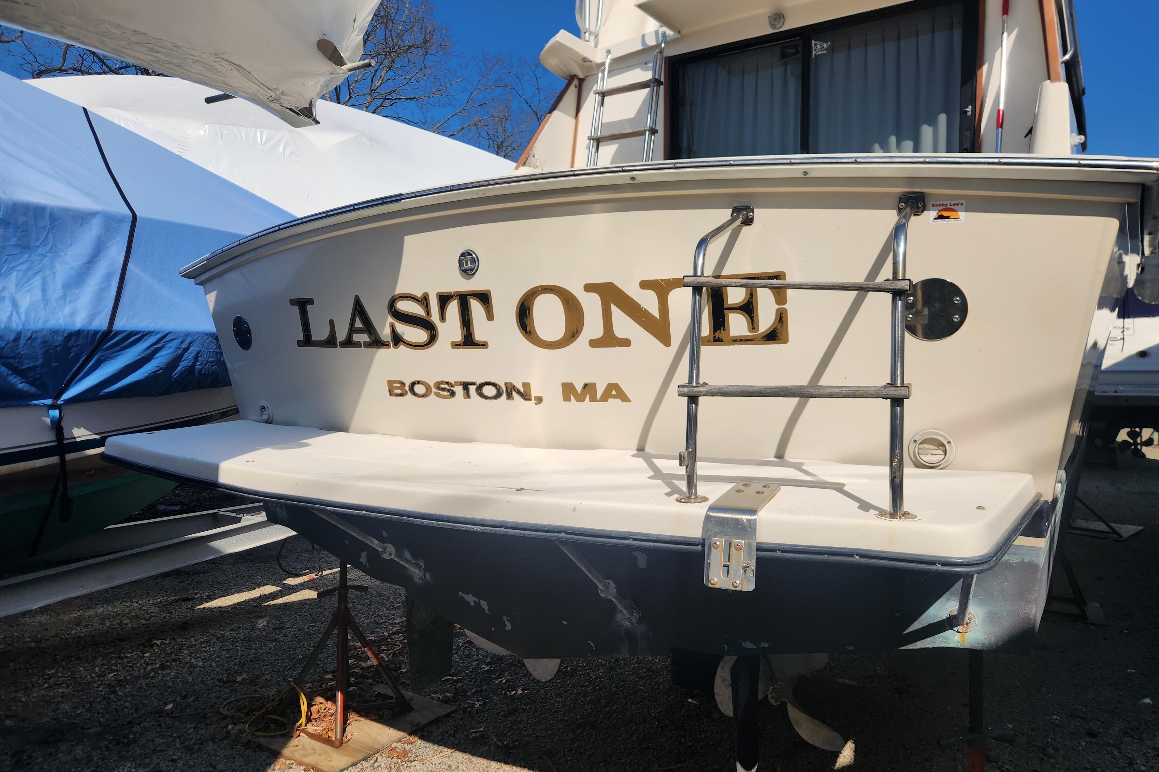 1987 Luhrs 40 Convertible boat named "Last One" docked in Boston, MA.