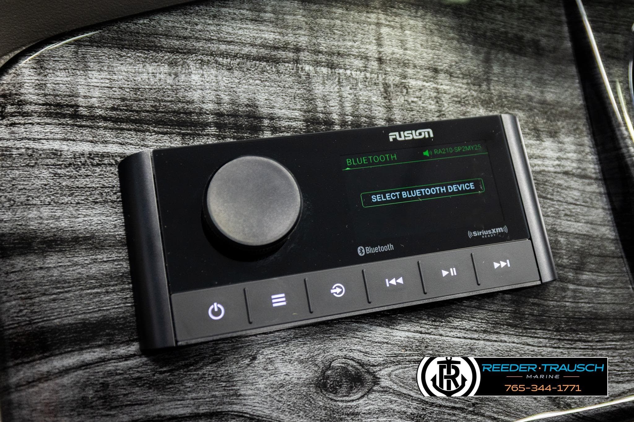 Control panel of Avalon LSZ QLS 2026 with Bluetooth connectivity on a sleek surface.