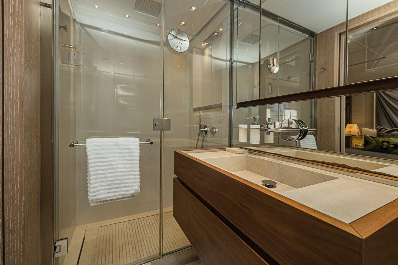 Luxurious bathroom in 2014 Sanlorenzo SL104-586 yacht with glass shower and modern vanity.