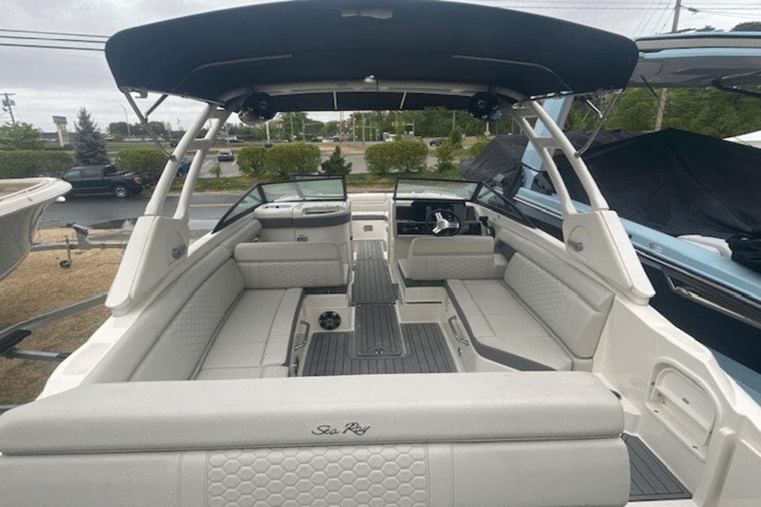 2021 Sea Ray SDX 270 boat interior with spacious seating and sleek design.