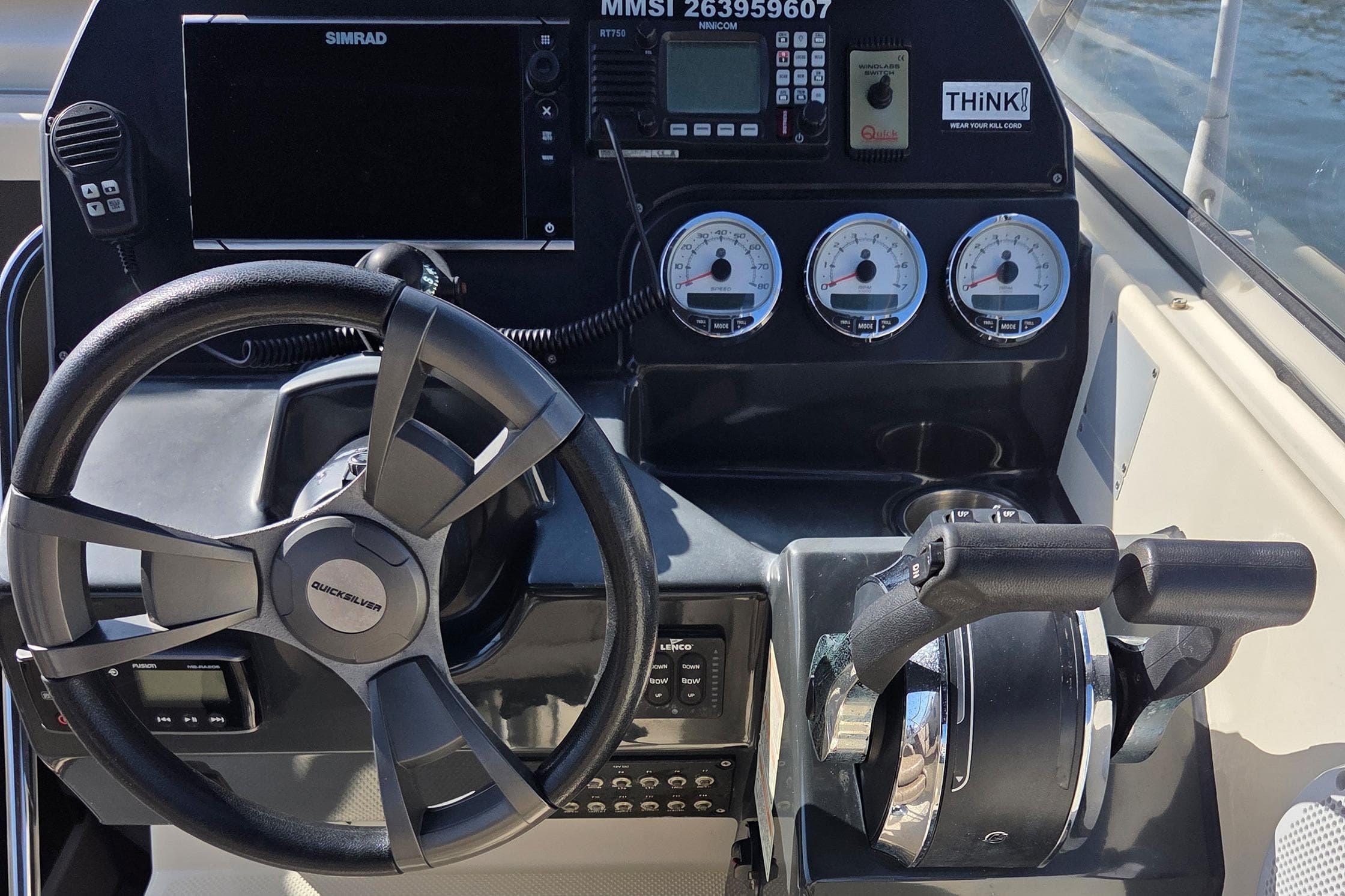Steering console of 2017 Quicksilver Activ 805 Cruiser with gauges and controls.