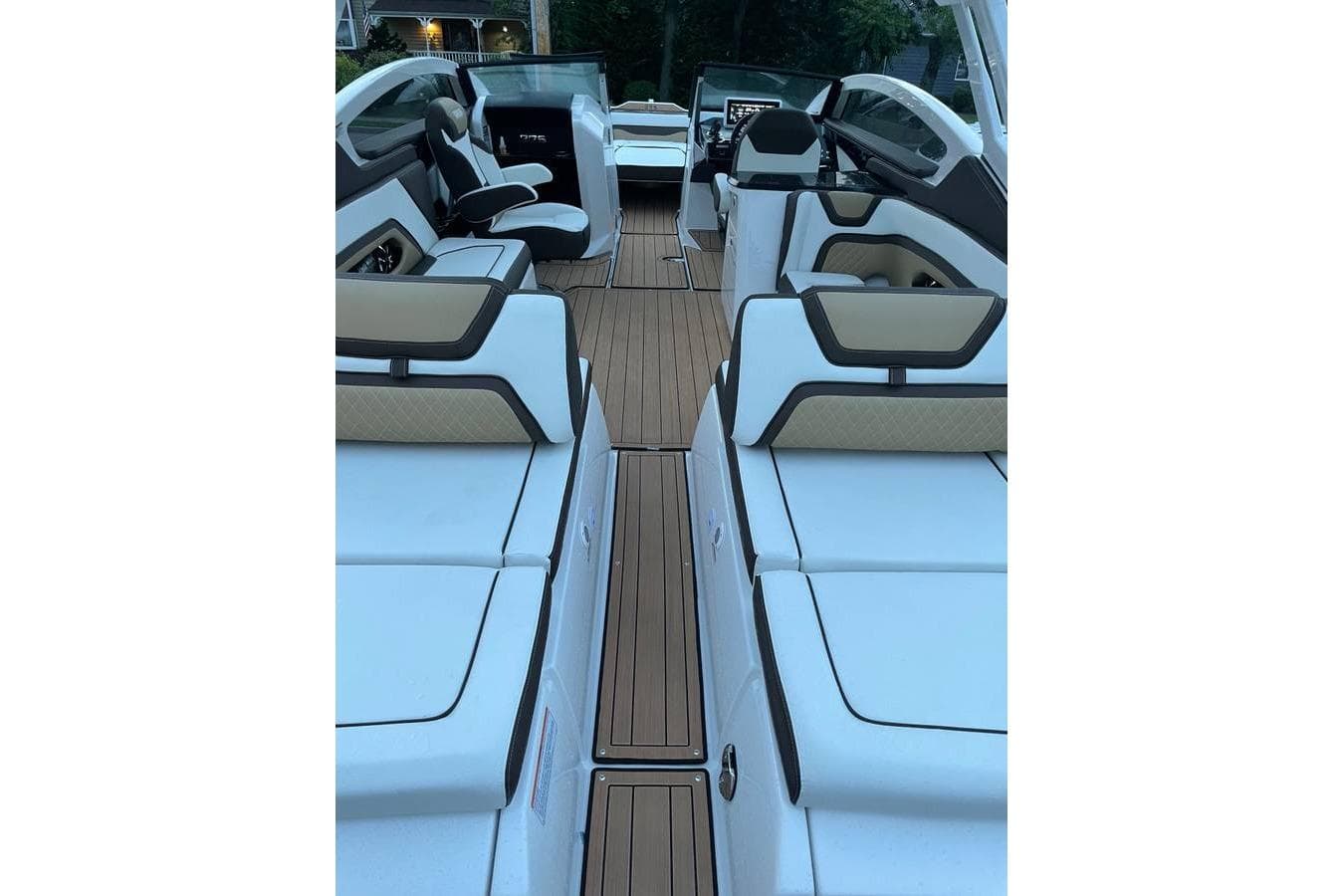 2021 Yamaha Boats 275SD interior with luxurious seating and sleek design.
