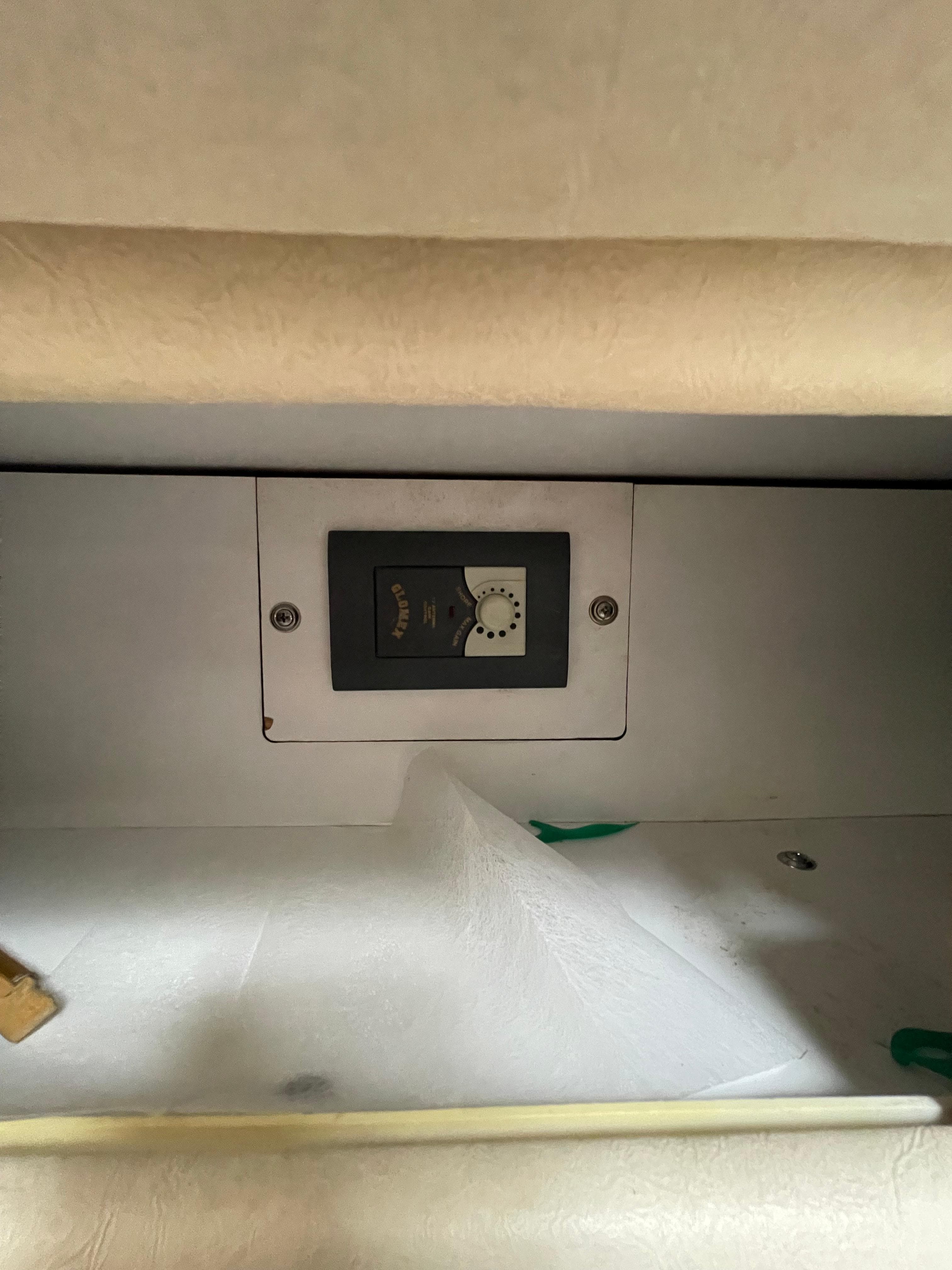 Control panel inside 2001 Sea Ray 310 Sundancer boat cabin.