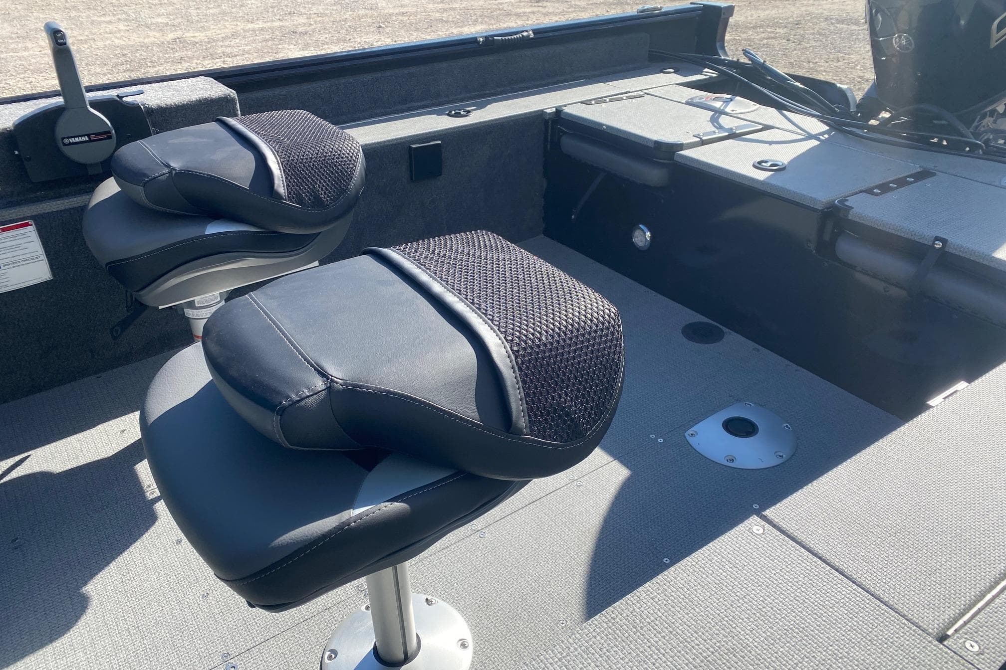 2026 G3 Angler V178 F boat interior with cushioned seats and control panel.