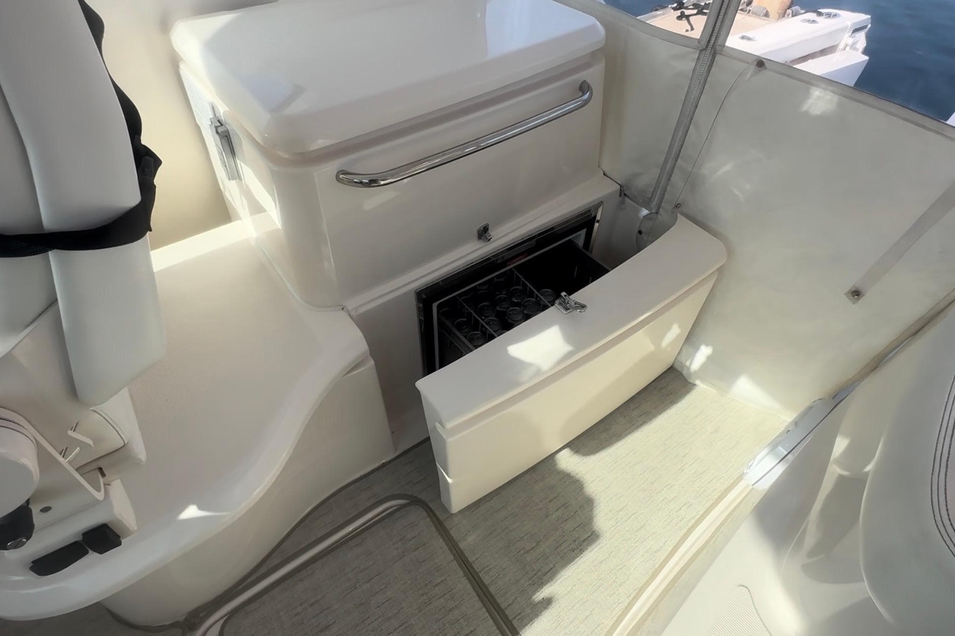 Interior of 2011 Tiara Yachts 4300 Open, featuring a built-in storage compartment.