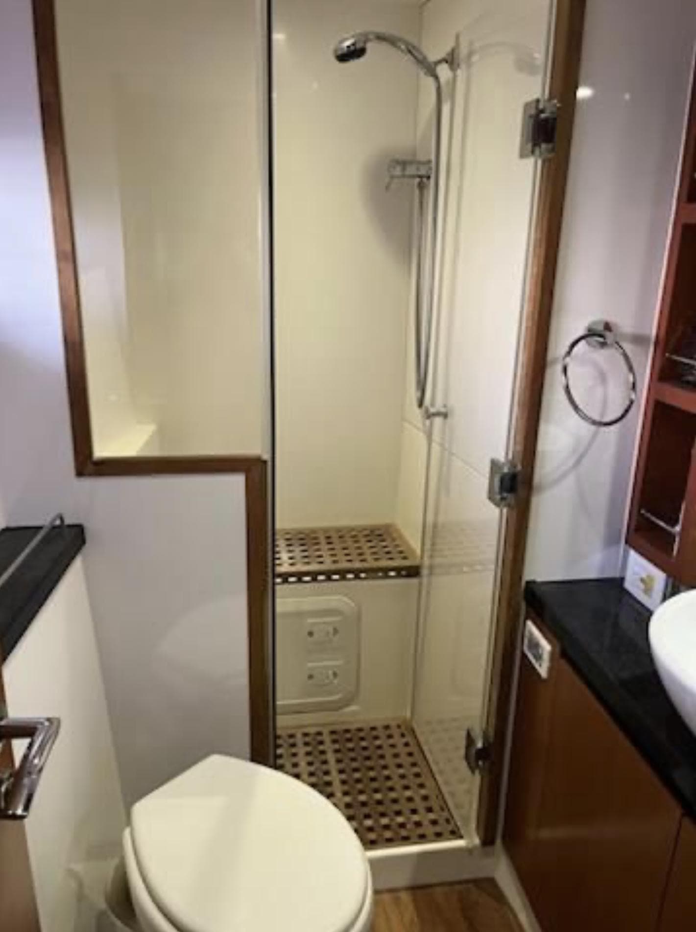 Bathroom interior of 2016 Aquila 44 Yacht with shower and toilet.