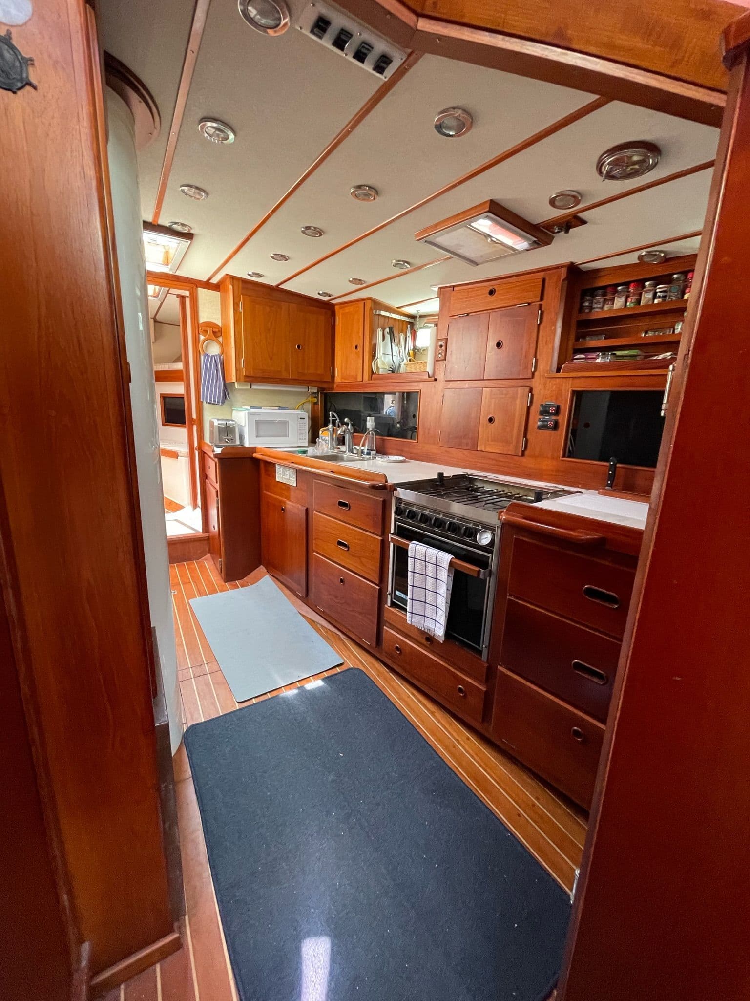 Interior view of a 1977 Alden Boothbay Explorer yacht kitchen.