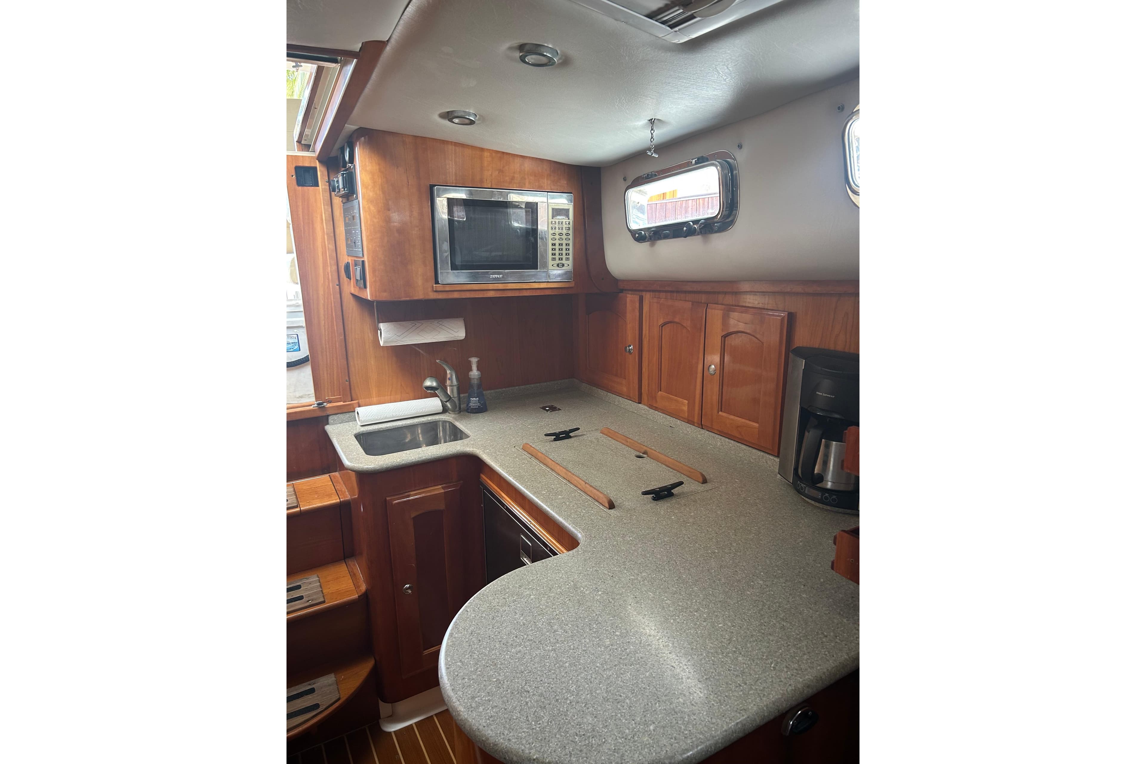 2007 Legacy Yachts Express galley with microwave and sink.